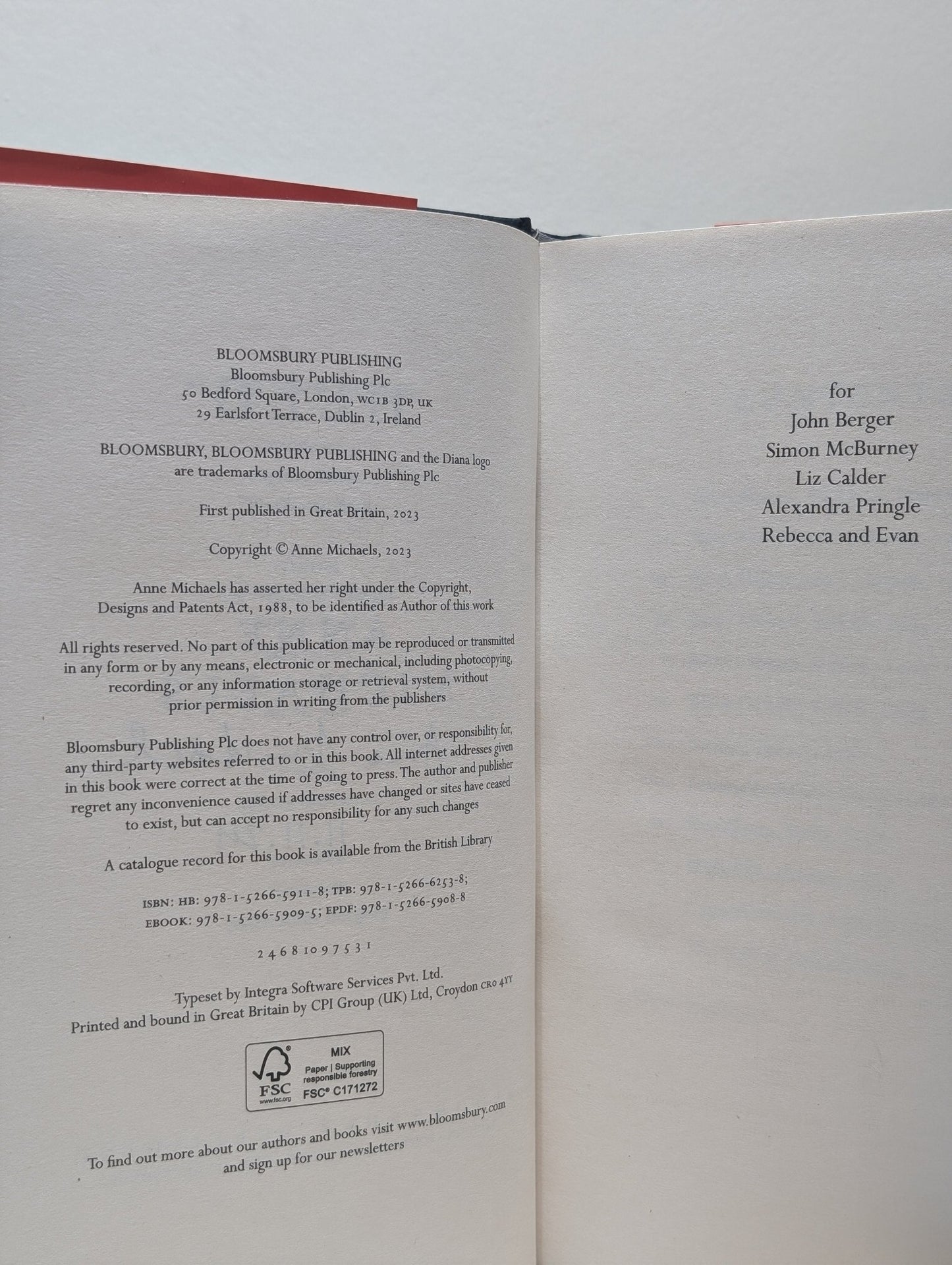 Held by Anne Michaels (Signed Dated First Edition) - Fialta Books