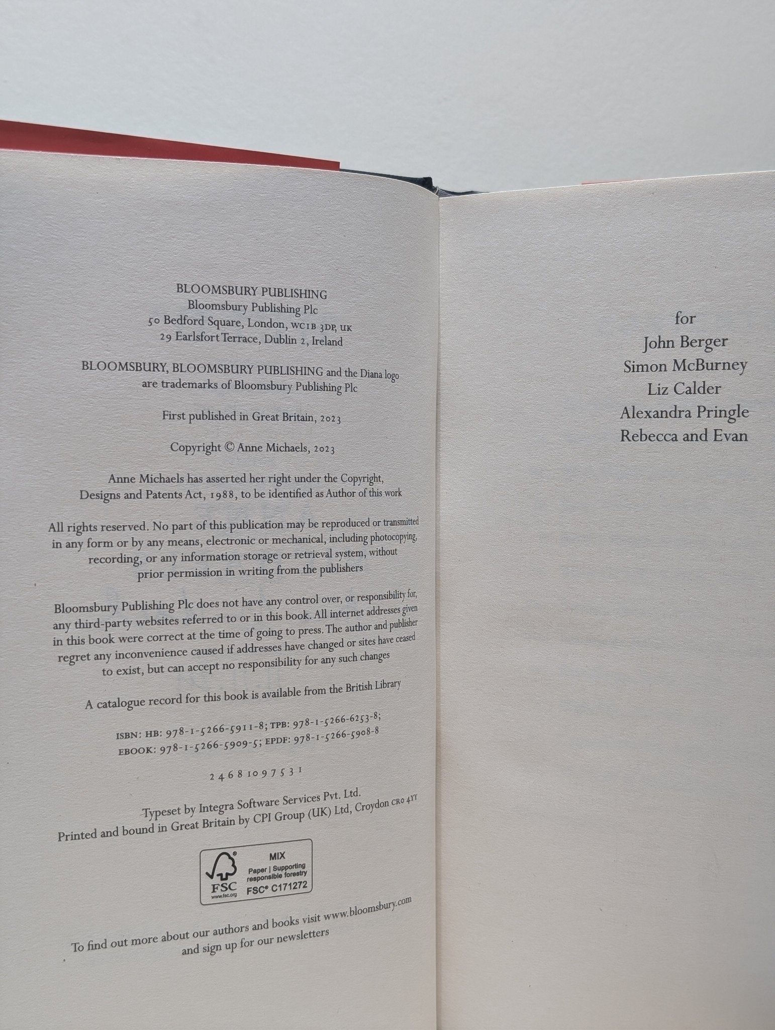 Held by Anne Michaels (Signed Dated First Edition) - Fialta Books