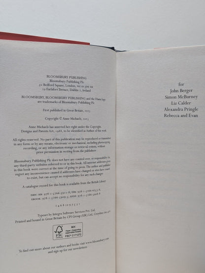 Held by Anne Michaels (Signed Dated First Edition) - Fialta Books