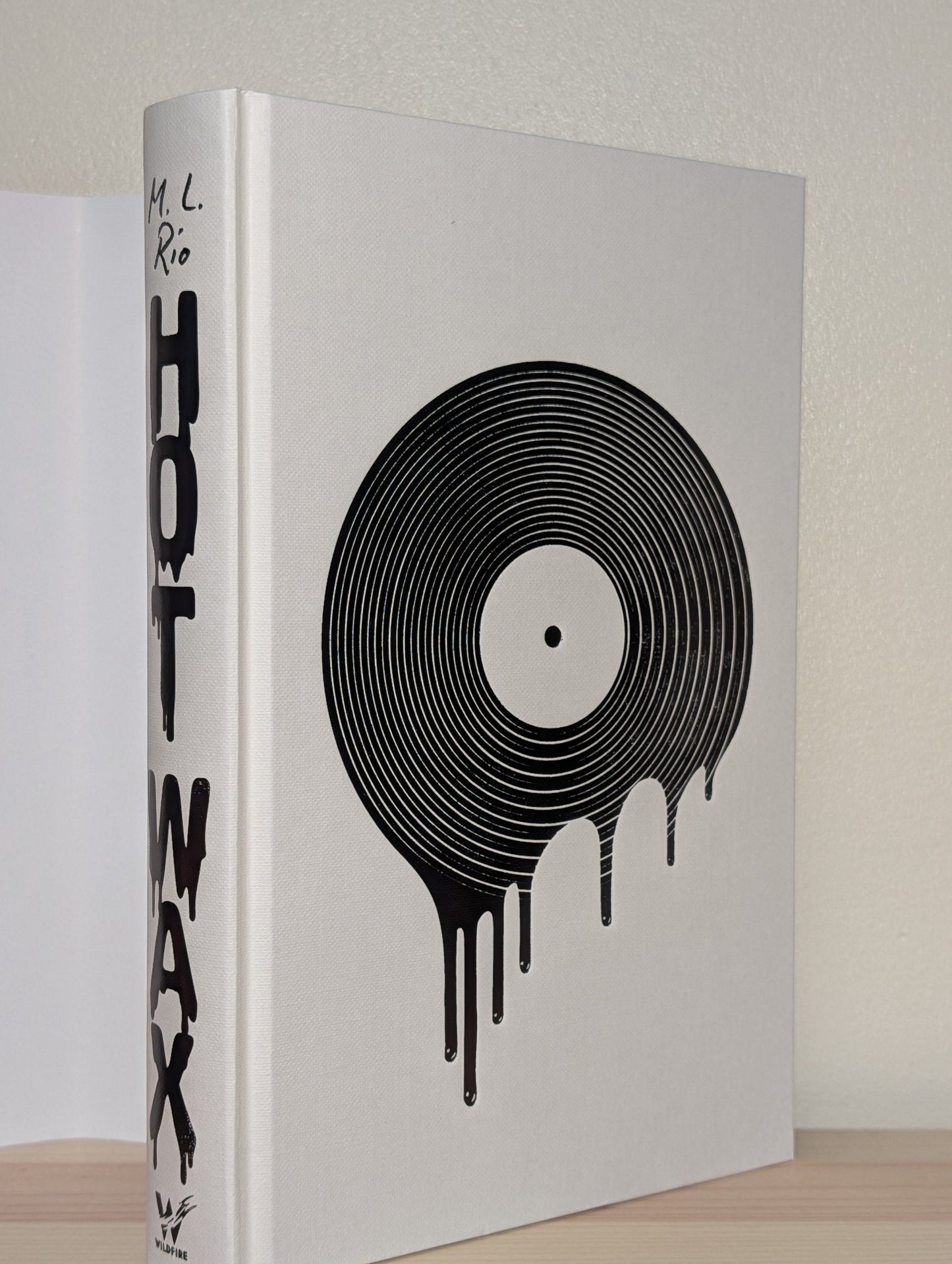 Hot Wax by M.L. Rio (Signed Tour Edition with sprayed edges) - Fialta Books