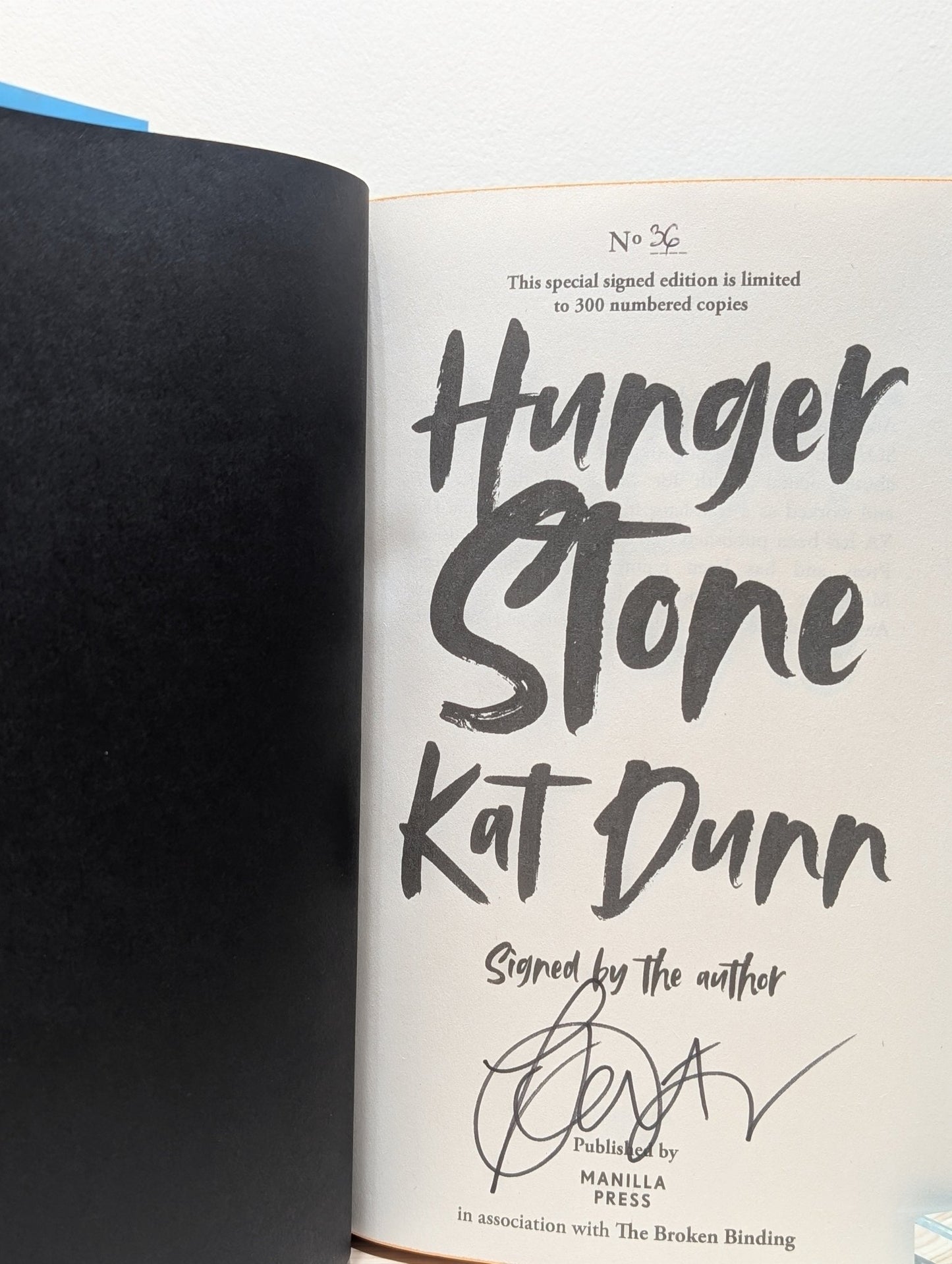 Hungerstone by Kat Dunn (Signed Numbered First Edition with sprayed edges) - Fialta Books