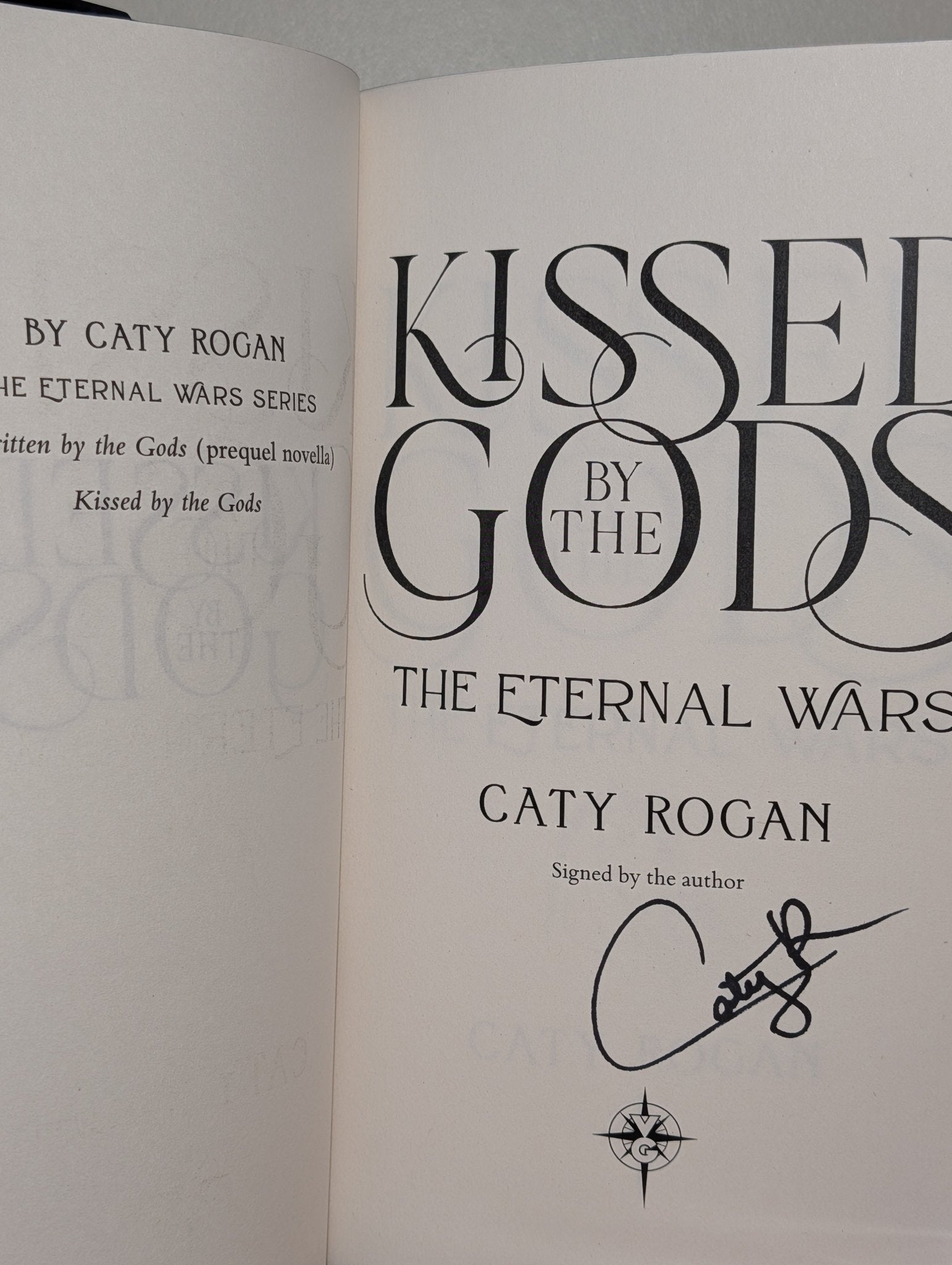 Kissed by the Gods by Caty Rogan (Signed First Edition with sprayed edges) - Fialta Books