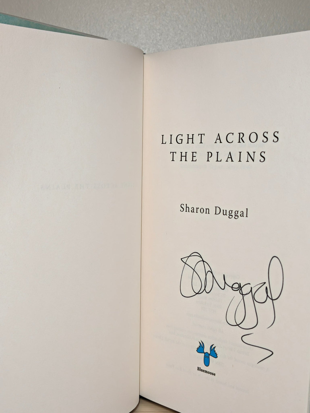 Light Across the Plains by Sharon Duggal (Signed First Edition) - Fialta Books