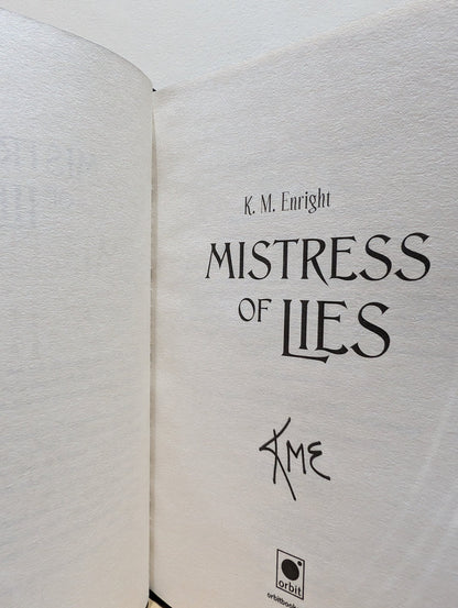 Mistress of Lies by K. M. Enright (Signed First Edition with sprayed edges) - Fialta Books
