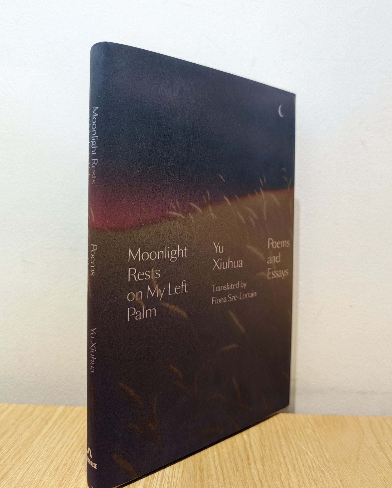 Moonlight Rests on My Left Palm: Poems and Essays by Yu Xiuhua (First Edition) - Fialta Books