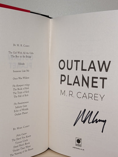 Outlaw Planet by M. R. Carey (Signed First Edition) - Fialta Books