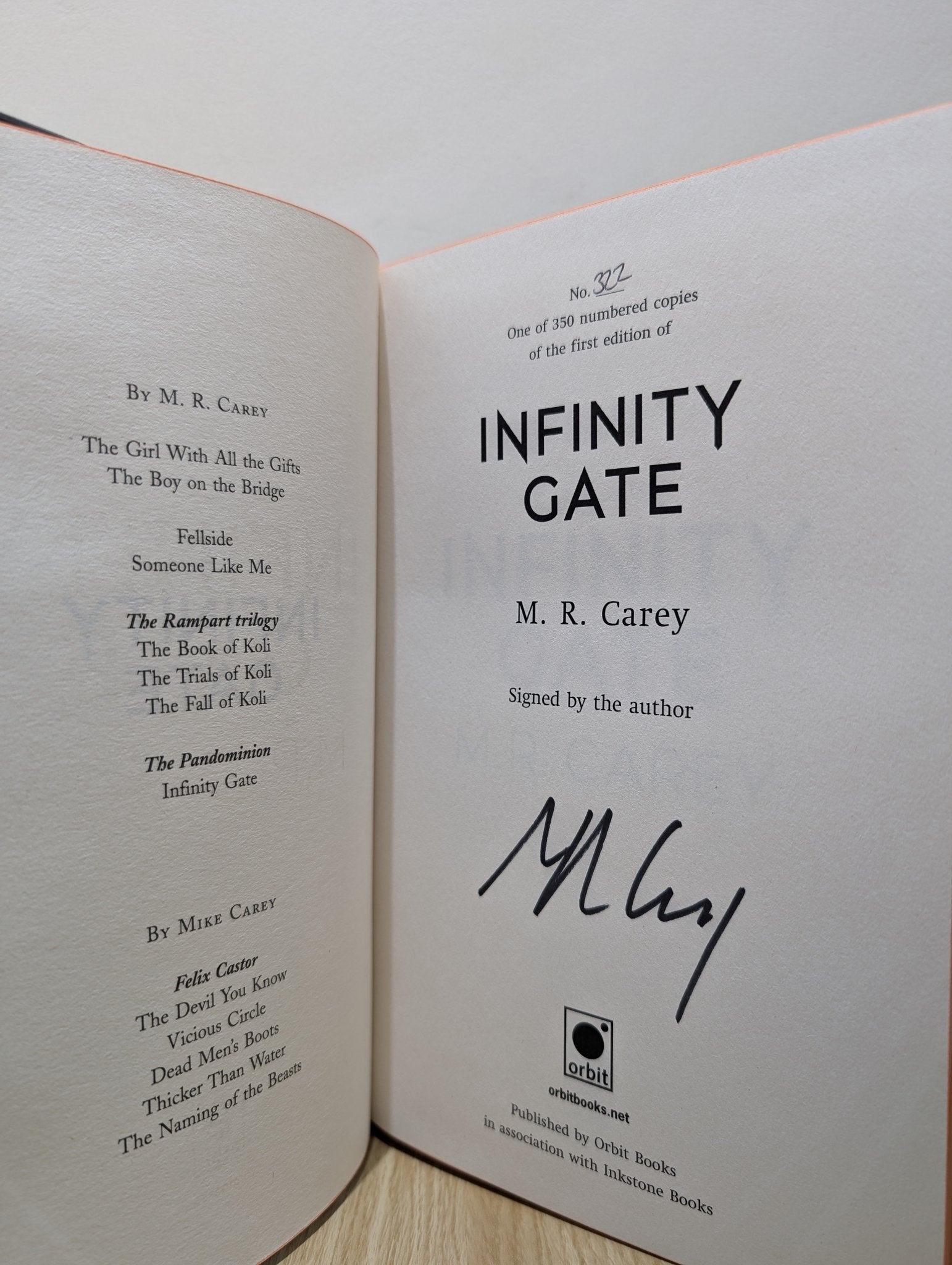 Pandominion 1 - 2: Infinity Gate; Echo of Worlds by M. R. Carey (Signed Set with sprayed edges) - Fialta Books