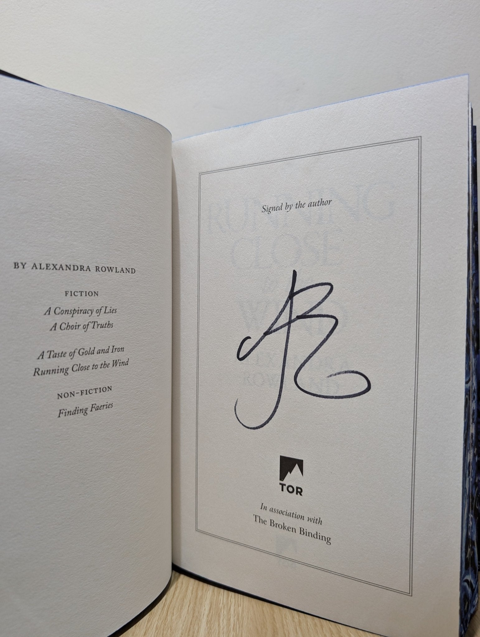 Running Close to the Wind by Alexandra Rowland (Signed First Edition with sprayed edges) - Fialta Books