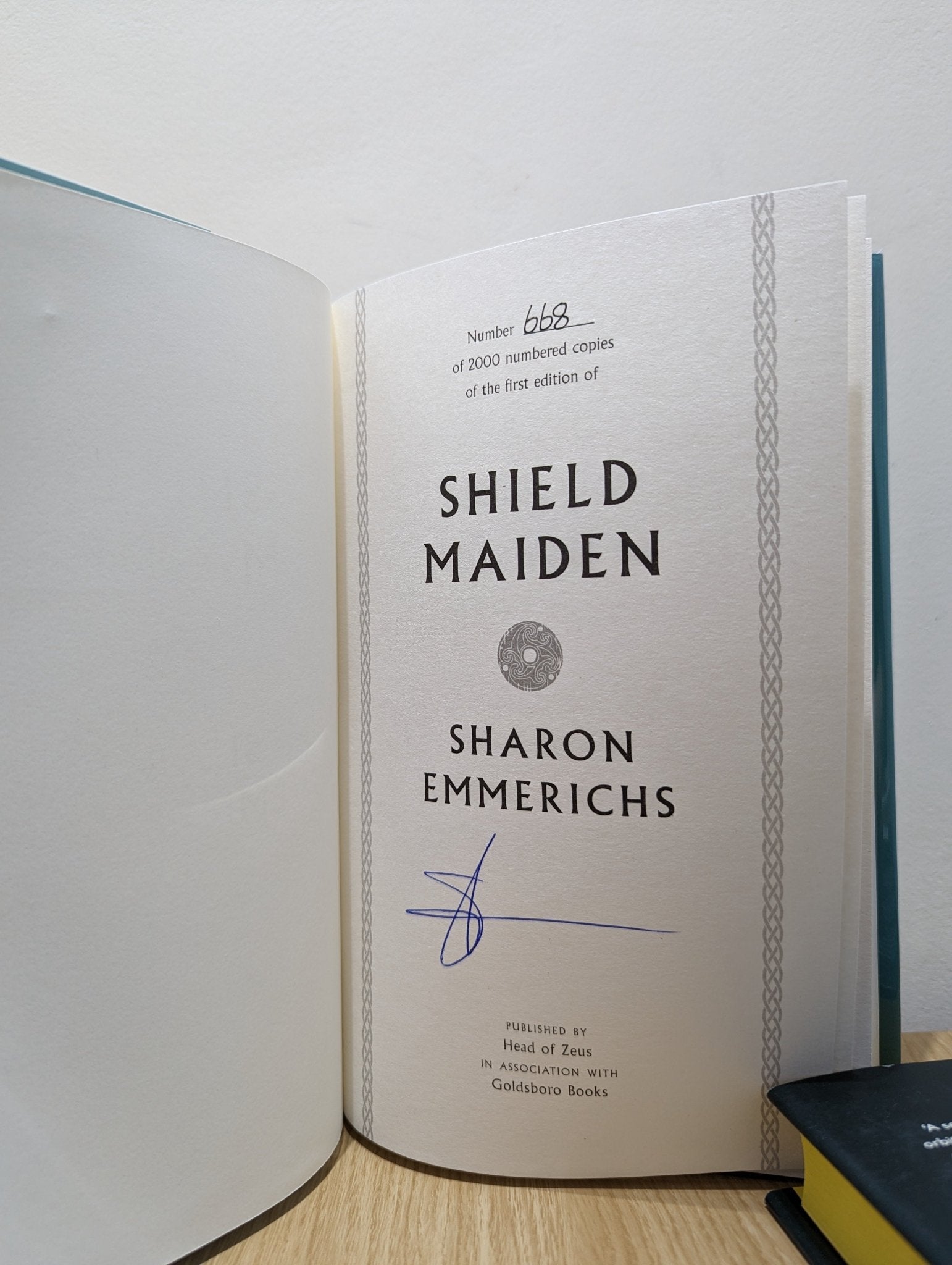 Shield Maiden by Sharon Emmerichs (Signed First Edition with sprayed edges) - Fialta Books