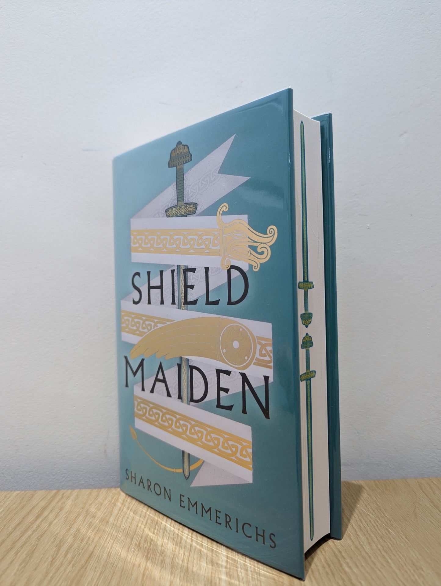 Shield Maiden by Sharon Emmerichs (Signed First Edition with sprayed edges) - Fialta Books