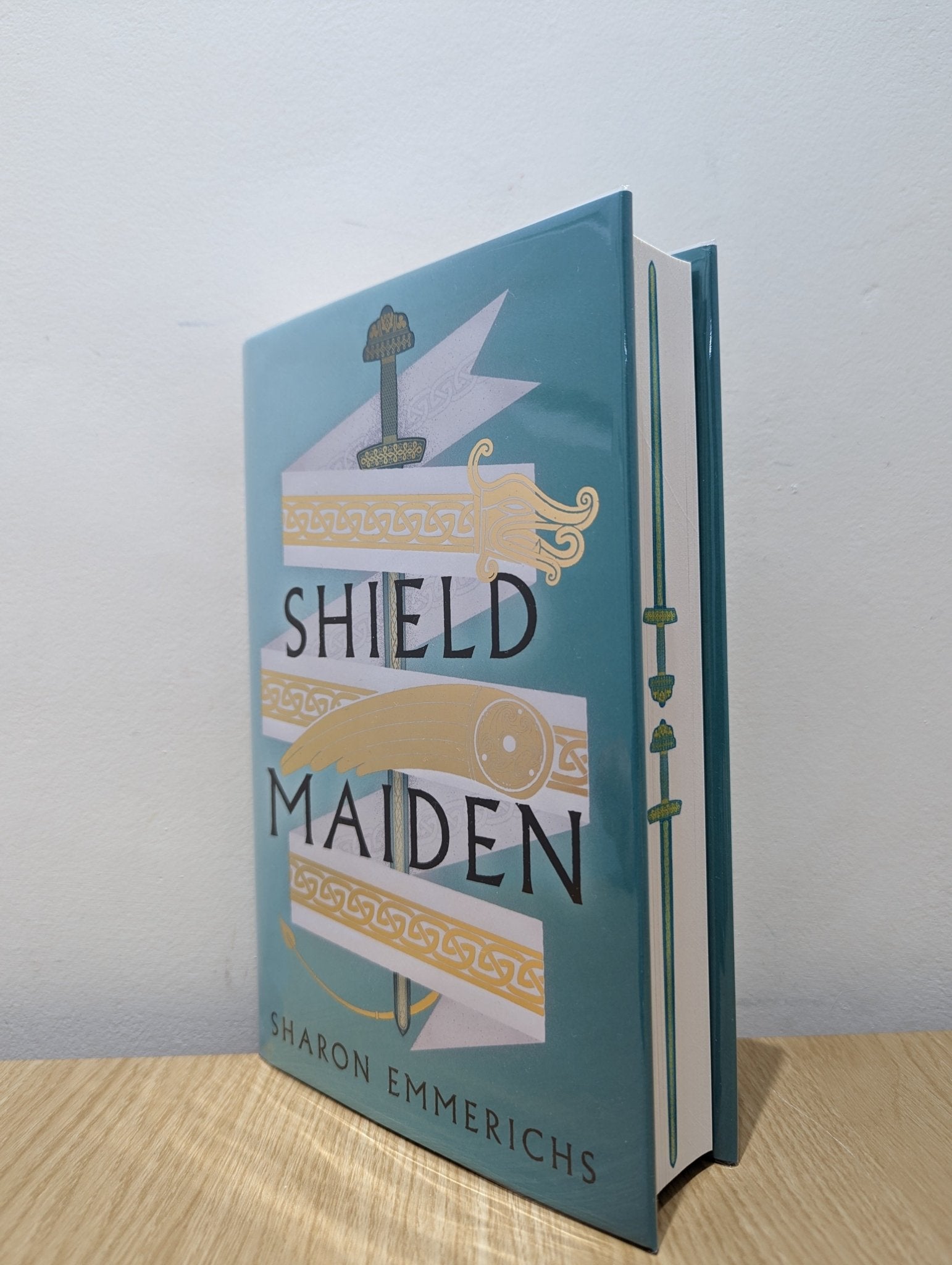 Shield Maiden by Sharon Emmerichs (Signed First Edition with sprayed edges) - Fialta Books