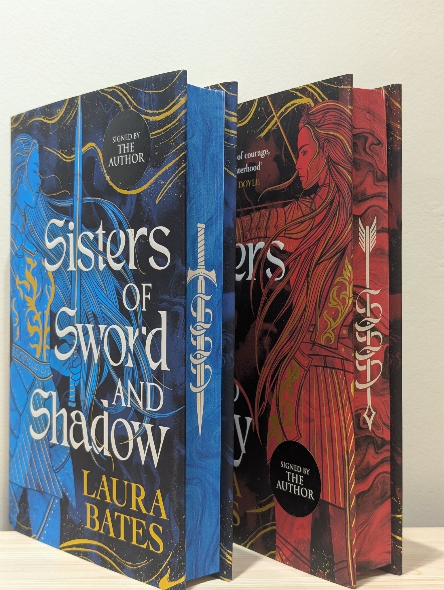 Sisters of Sword and Shadow; Sisters of Fire and Fury by Laura Bates (Signed Set with sprayed edges) - Fialta Books