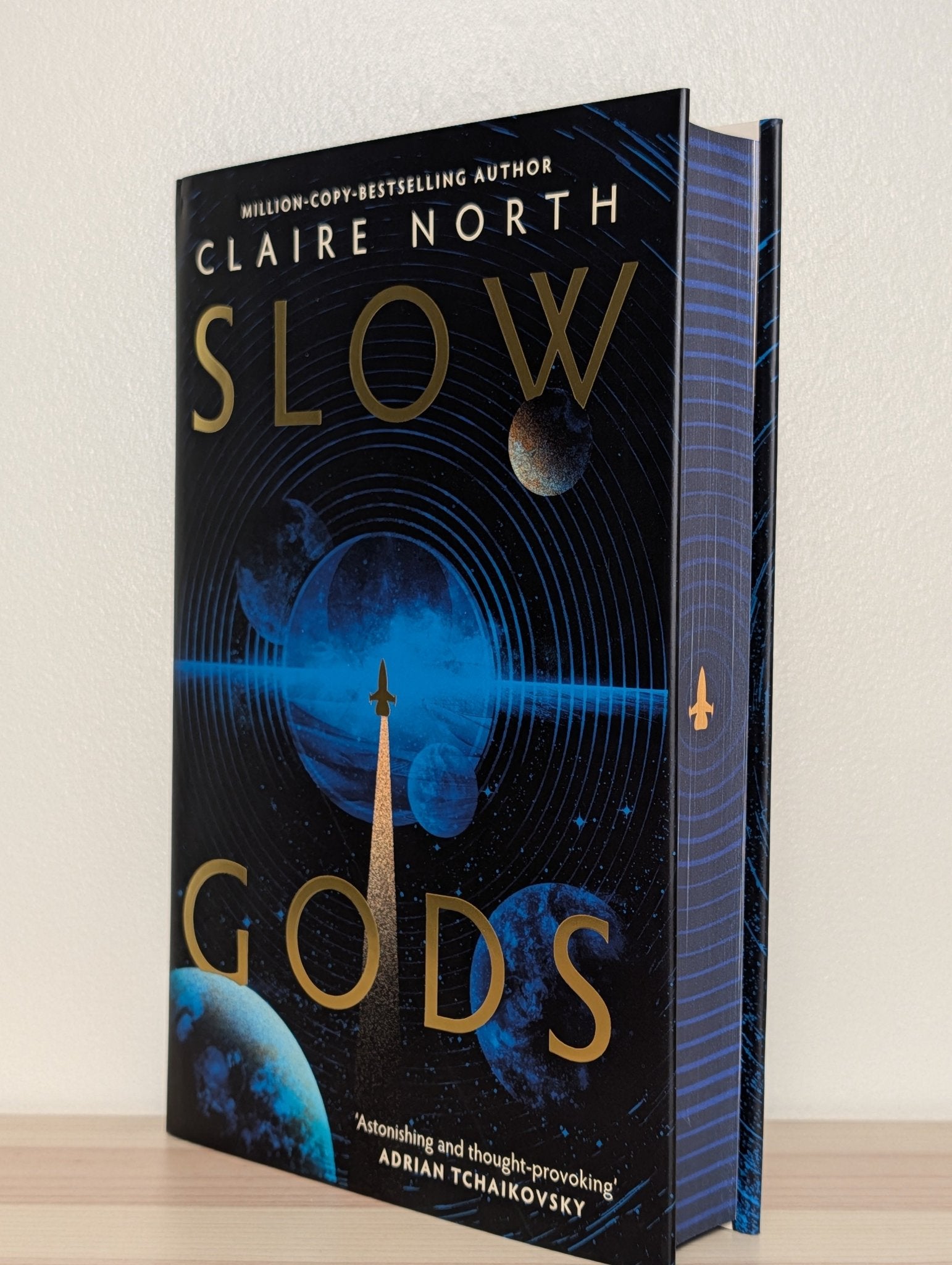 Slow Gods by Claire North (Signed First Edition with sprayed edges) - Fialta Books