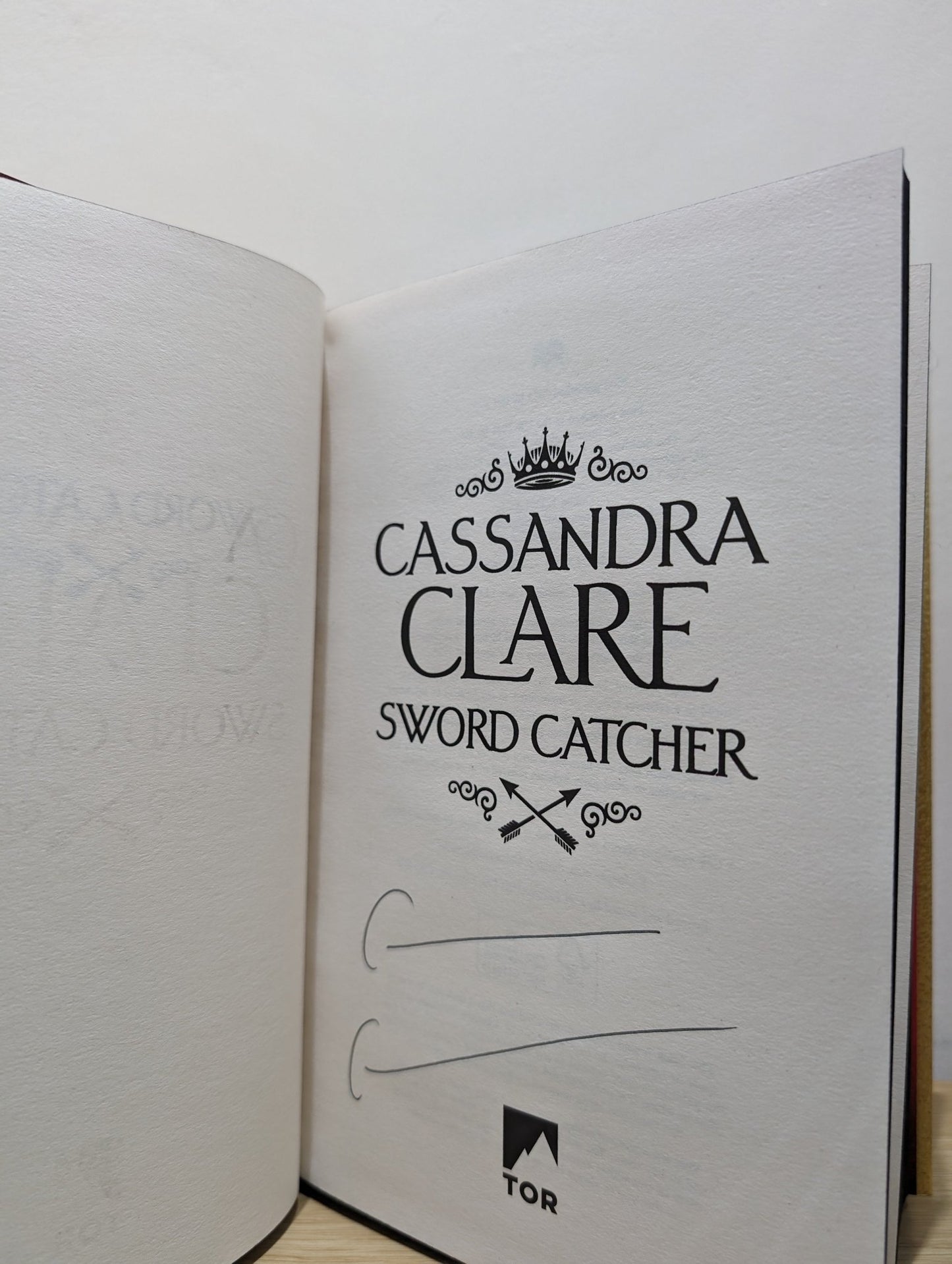 Sword Catcher by Cassandra Clare (Signed First Edition with sprayed edges and postcard) - Fialta Books