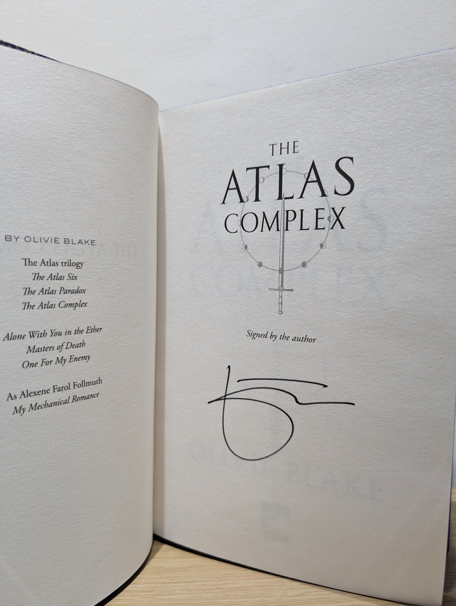 The Atlas Complex by Olivie Blake (Signed First Edition with sprayed edges) - Fialta Books