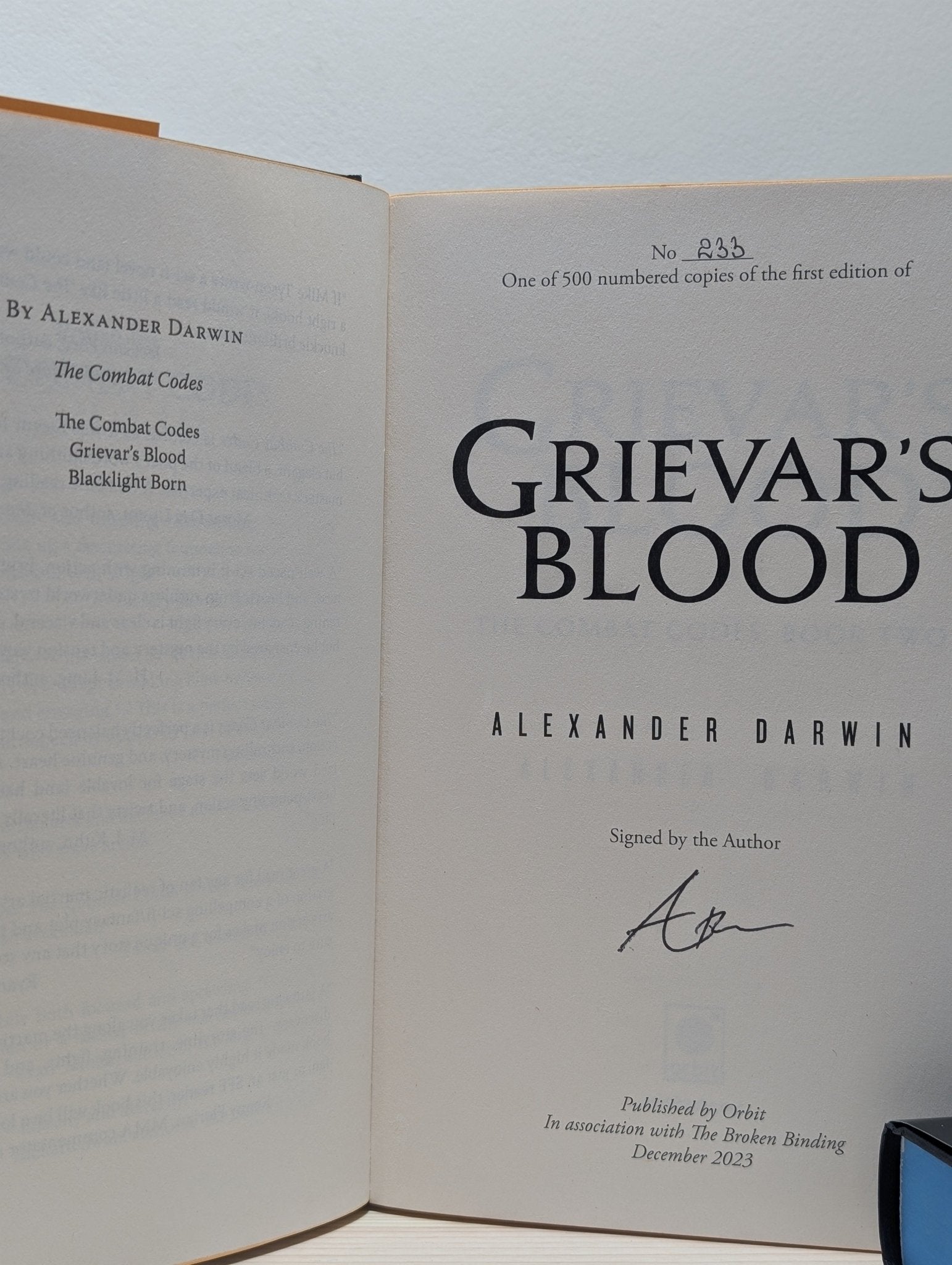 The Combat Codes; Grievar's Blood; Blacklight Born by Alexander Darwin (Signed with sprayed edges) - Fialta Books