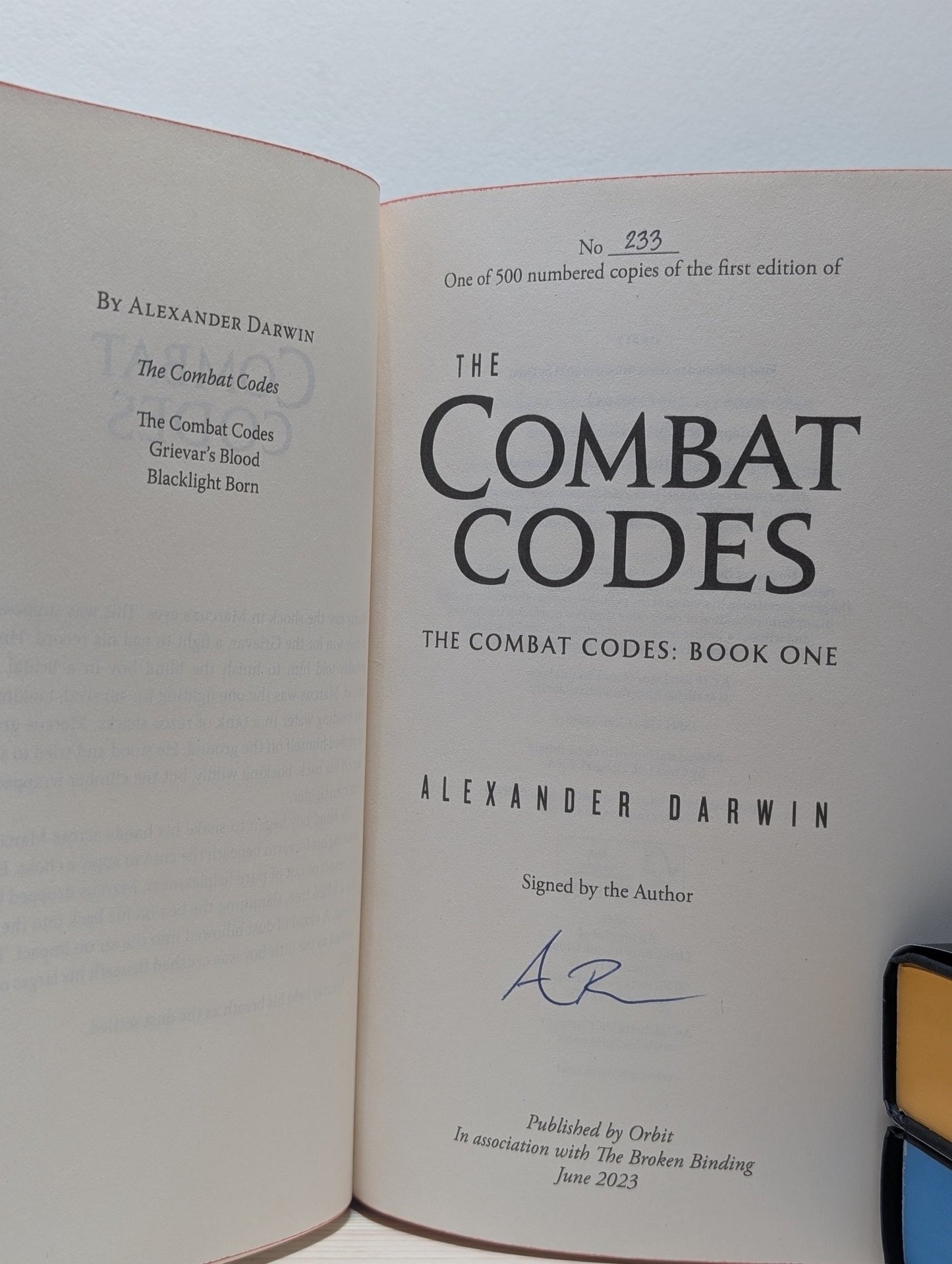 The Combat Codes; Grievar's Blood; Blacklight Born by Alexander Darwin (Signed with sprayed edges) - Fialta Books