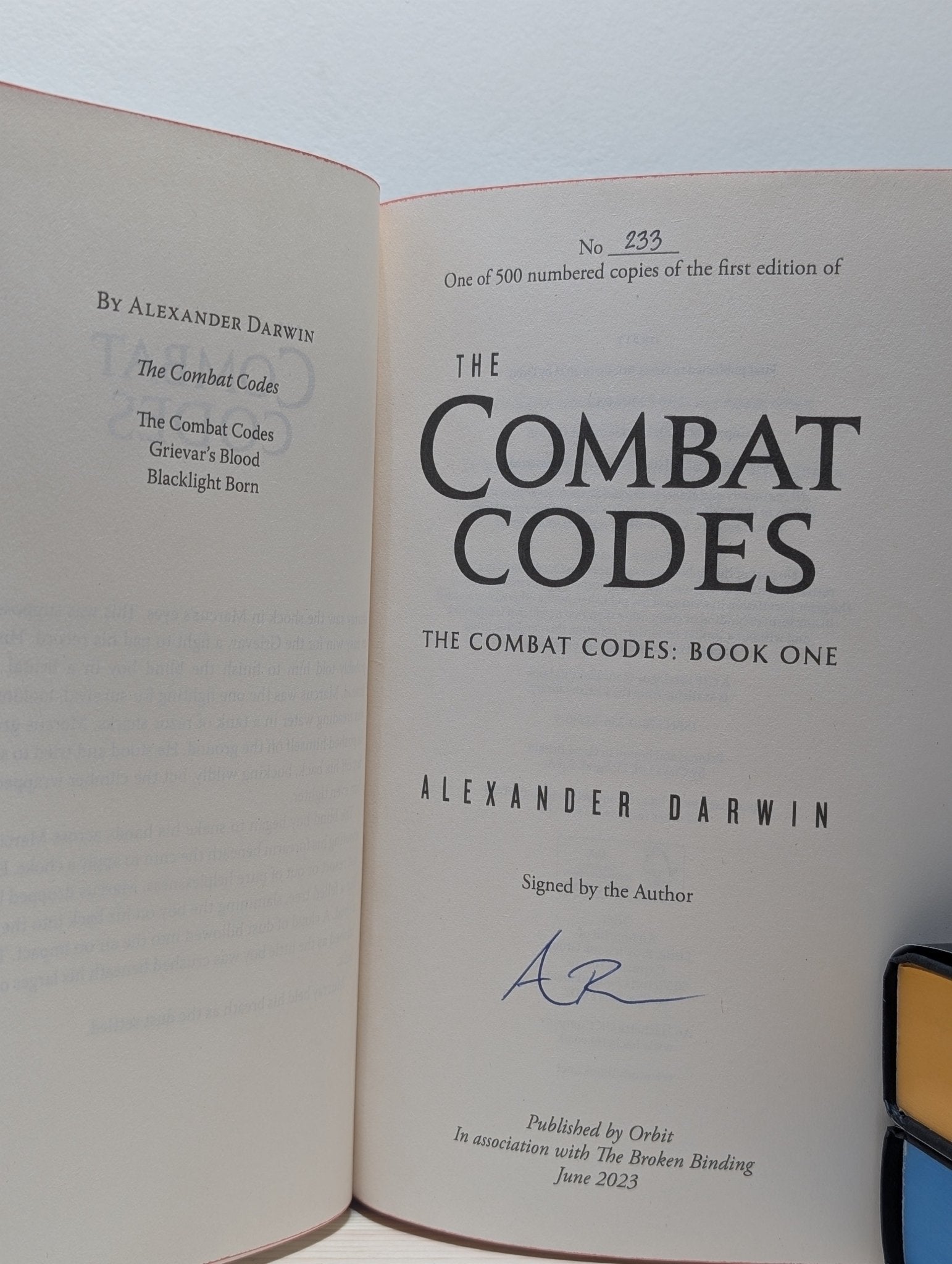 The Combat Codes; Grievar's Blood; Blacklight Born by Alexander Darwin (Signed with sprayed edges) - Fialta Books