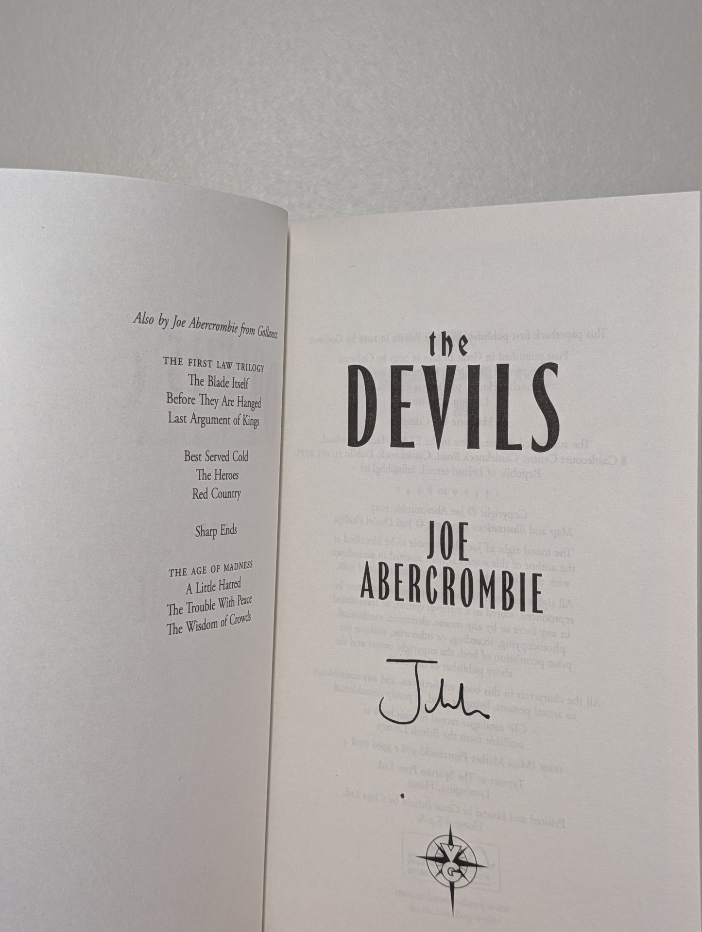 The Devils by Joe Abercrombie (Signed Paperback) - Fialta Books