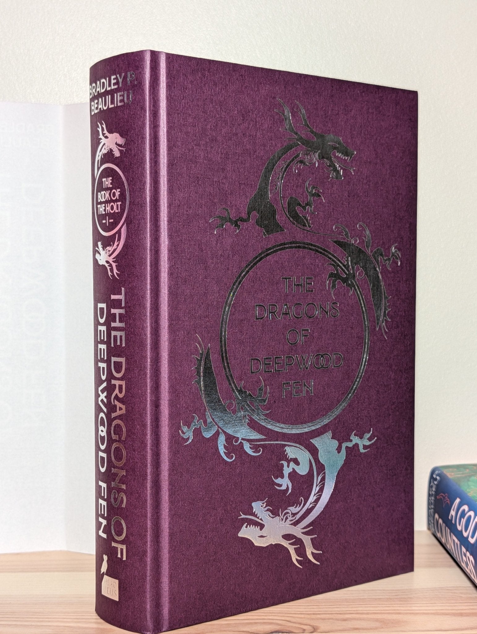 The Dragons of Deepwood Fen; A God of Countless Guises by Bradley P. Beaulieu (Signed First Edition with sprayed edges) - Fialta Books