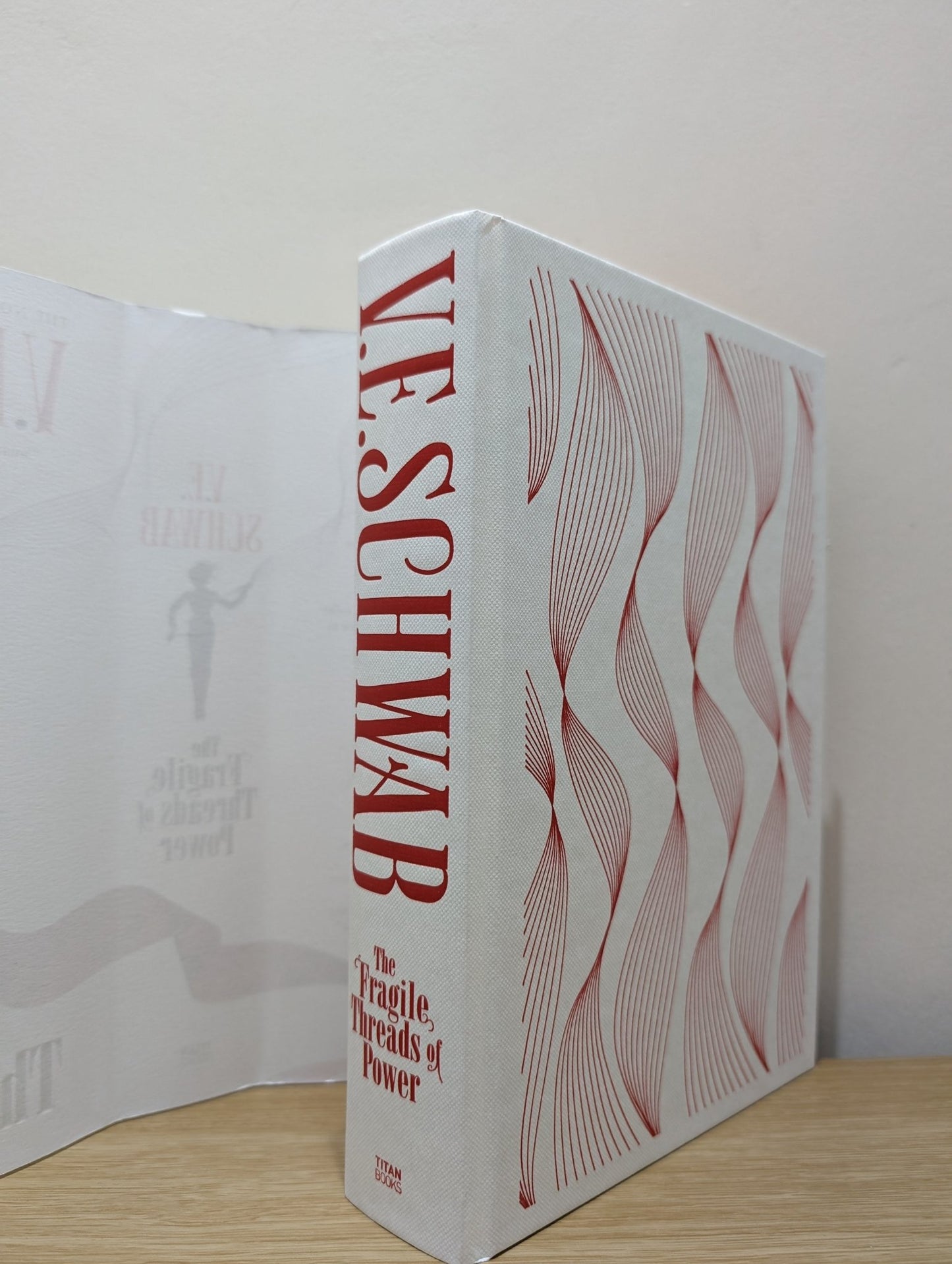 The Fragile Threads of Power by V.E. Schwab (Signed First Edition with sprayed map edges) - Fialta Books