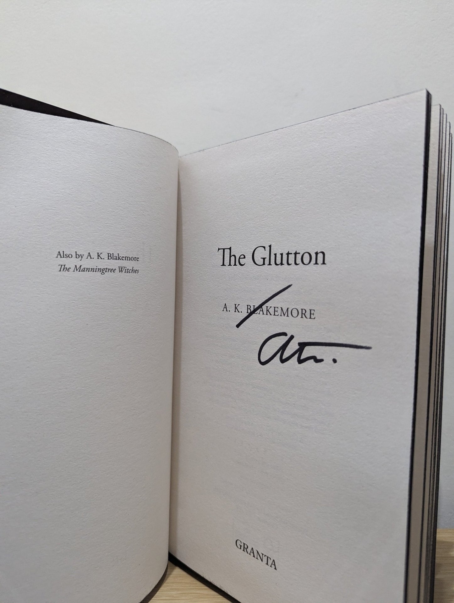 The Glutton by A. K. Blakemore (Signed First Edition with sprayed edges) - Fialta Books