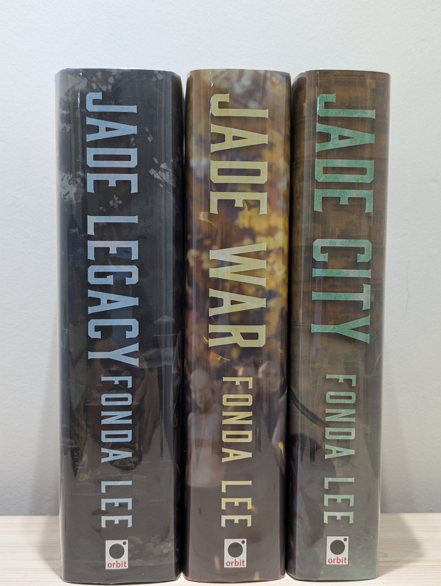 The Green Bone Saga: Jade City; Jade War; Jade Legacy by Fonda Lee (Signed Special Edition with sprayed edges) - Fialta Books