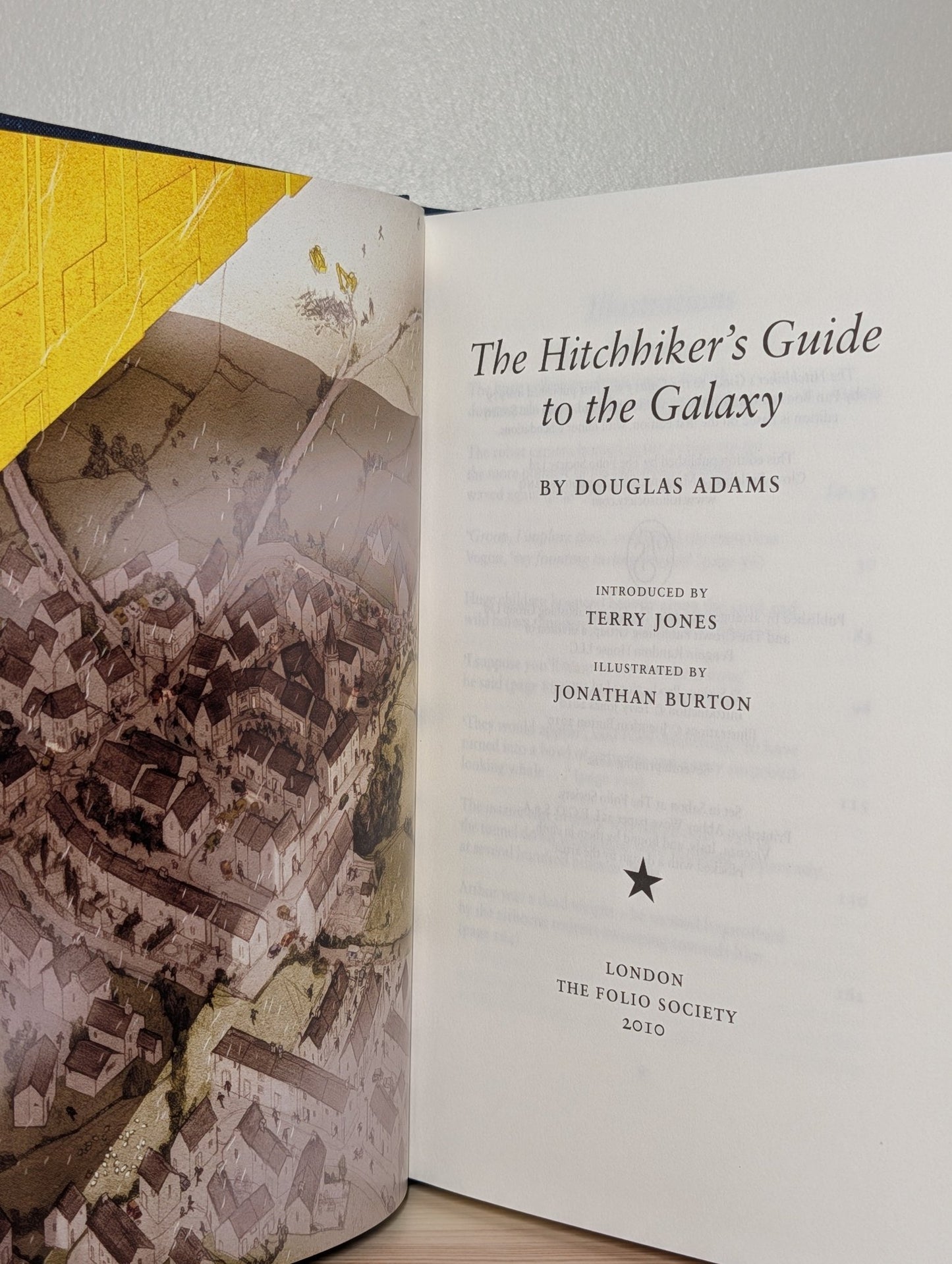 The Hitchhiker's Guide to the Galaxy by Douglas Adams (Folio Slipcase Edition) - Fialta Books