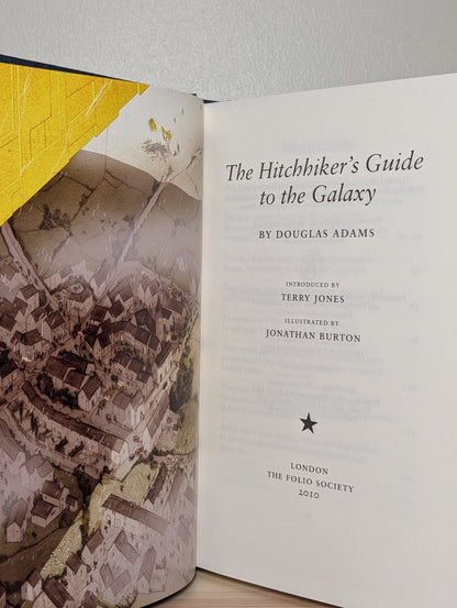 The Hitchhiker's Guide to the Galaxy by Douglas Adams (Folio Slipcase Edition) - Fialta Books