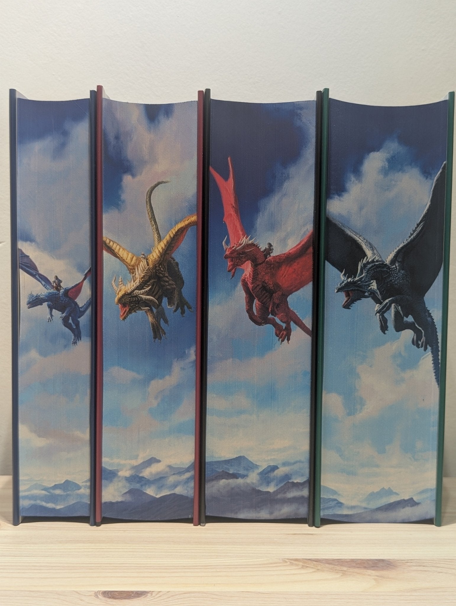 The Inheritance Cycle: Eragon; Eldest; Brisingr; Inheritance by Christopher Paolini (Signed Special Edition with sprayed edges) - Fialta Books