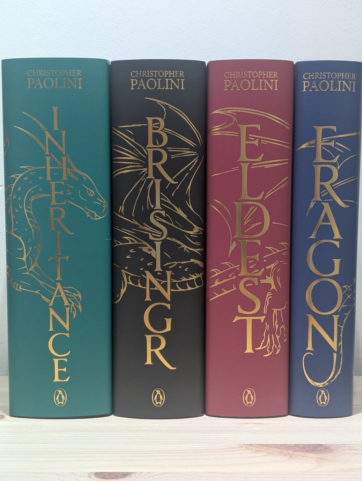 The Inheritance Cycle: Eragon; Eldest; Brisingr; Inheritance by Christopher Paolini (Signed Special Edition with sprayed edges) - Fialta Books