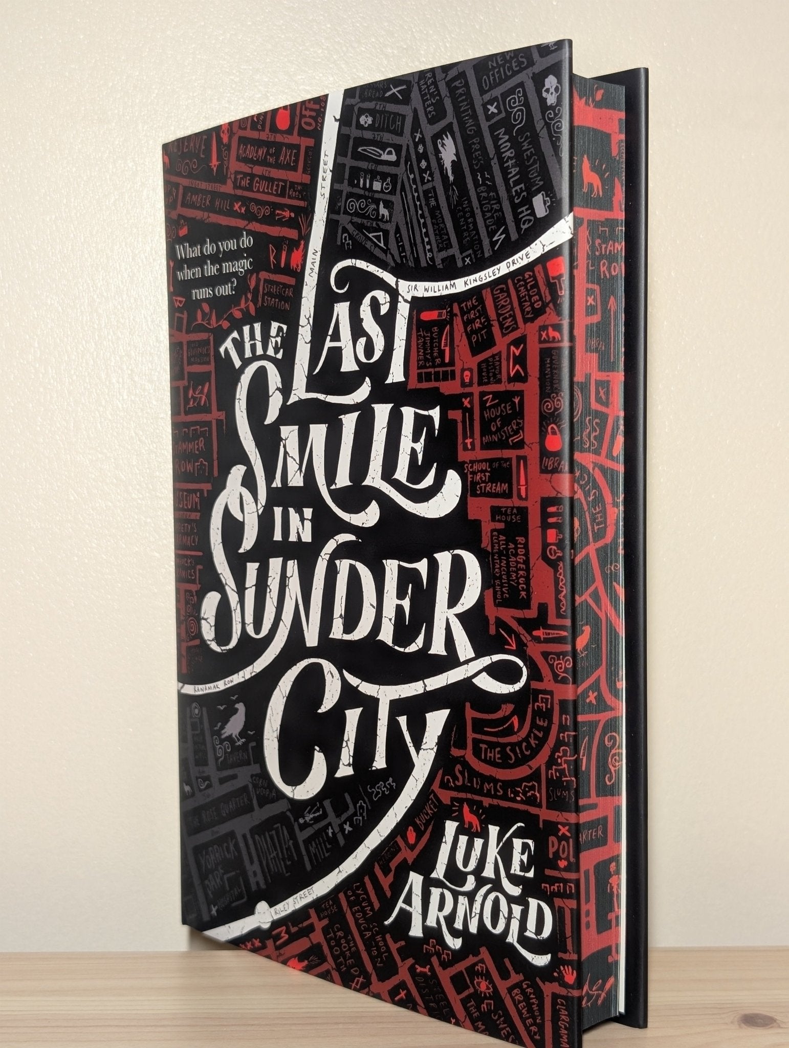 The Last Smile in Sunder City by Luke Arnold (Signed First Edition with sprayed edges) - Fialta Books