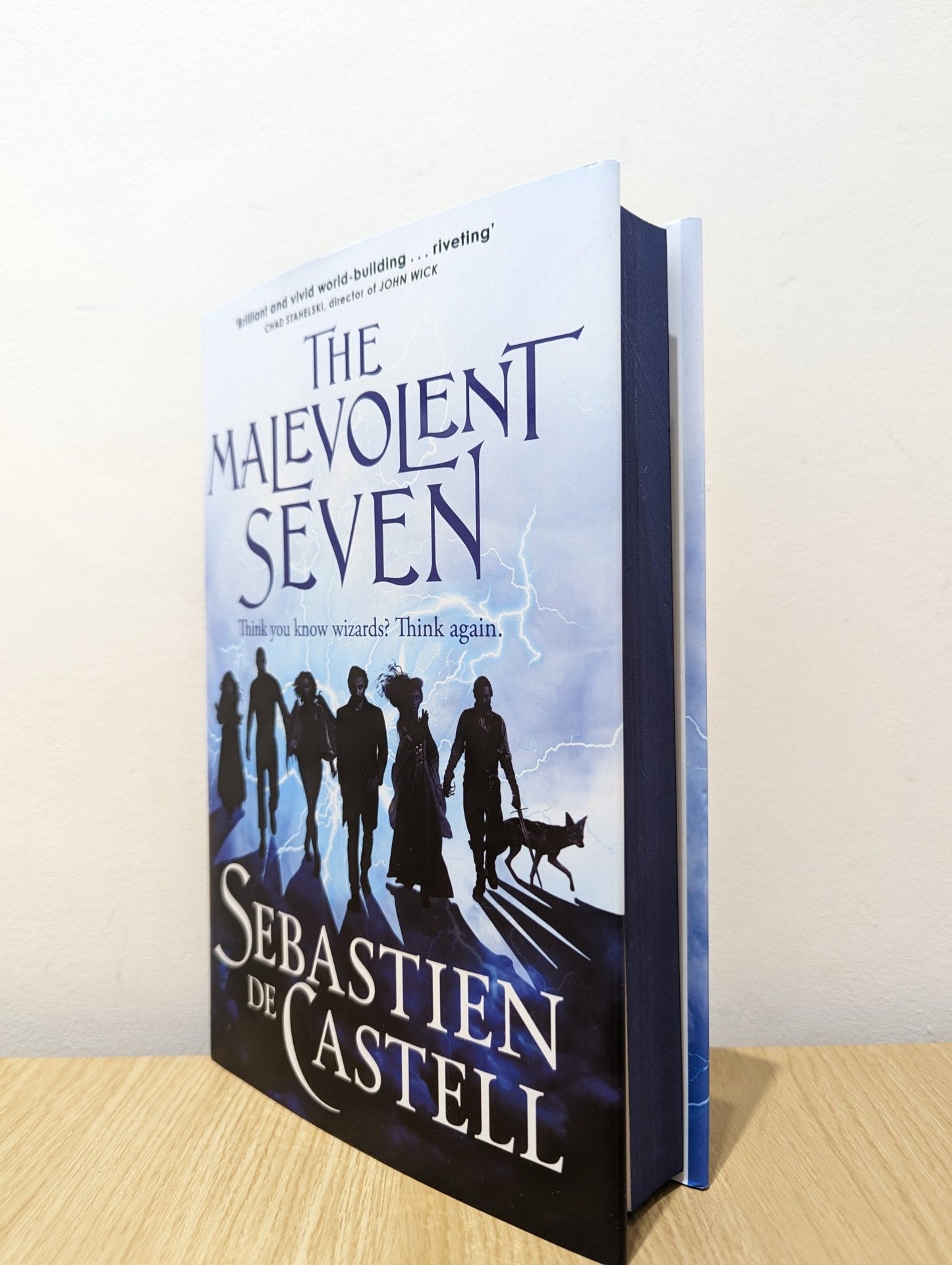 The Malevolent Seven by Sebastien De Castell (Signed First Edition with sprayed edges) - Fialta Books
