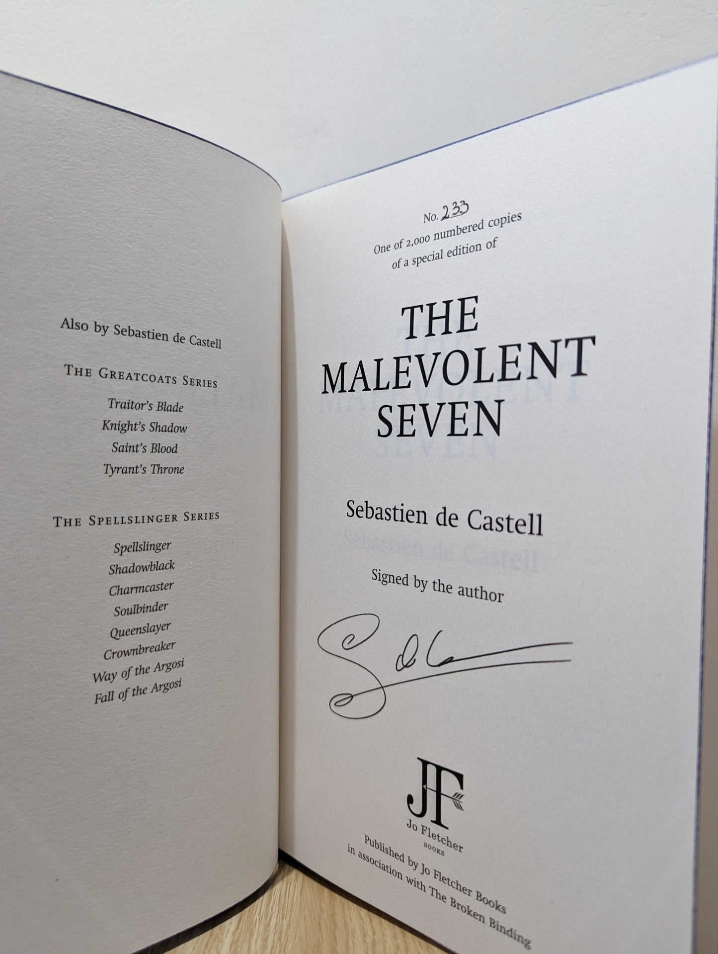 The Malevolent Seven by Sebastien De Castell (Signed First Edition with sprayed edges) - Fialta Books