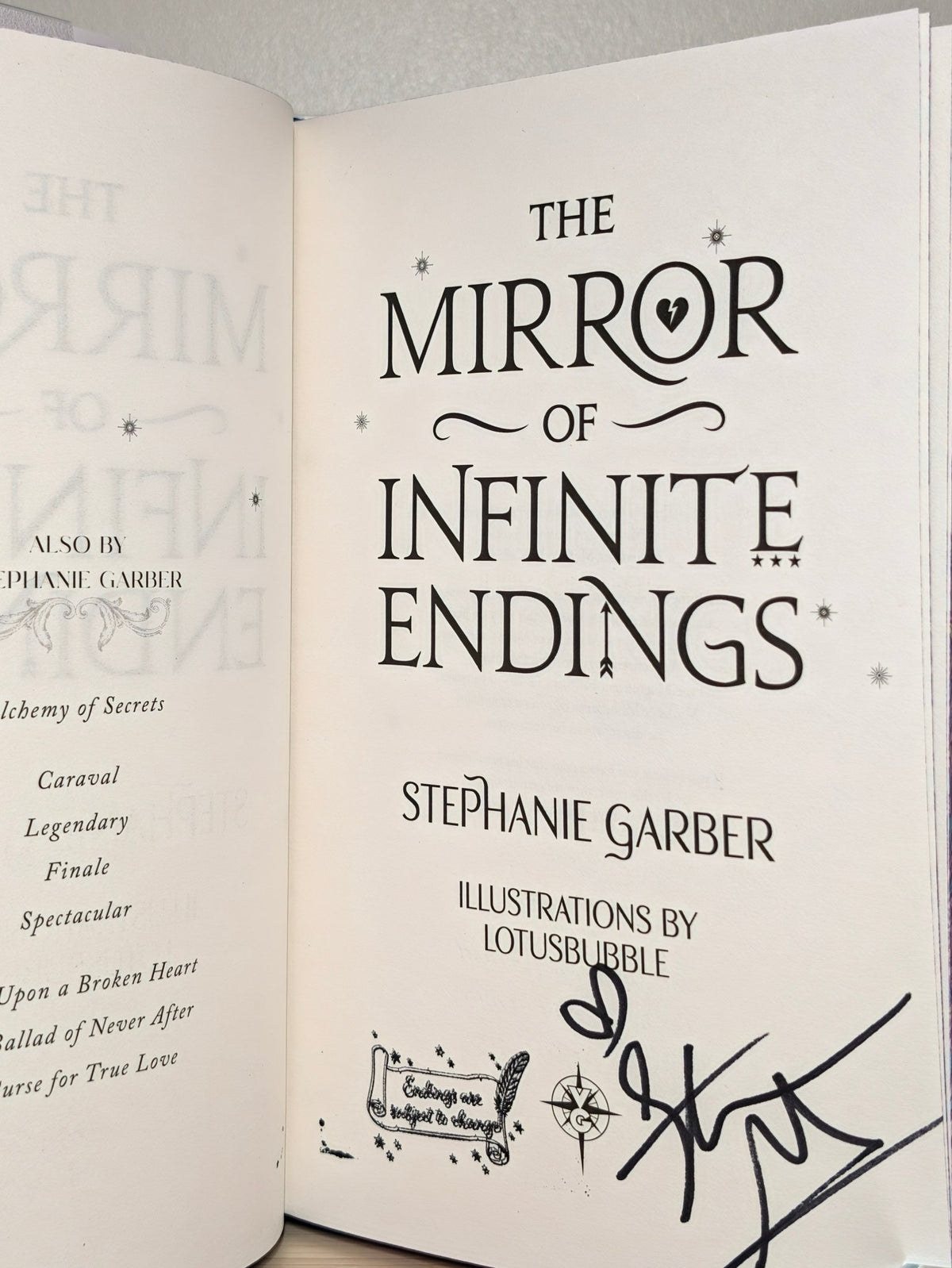 The Mirror of Infinite Endings by Stephanie Garber (Signed with sprayed edges and broken heart cover) - Fialta Books