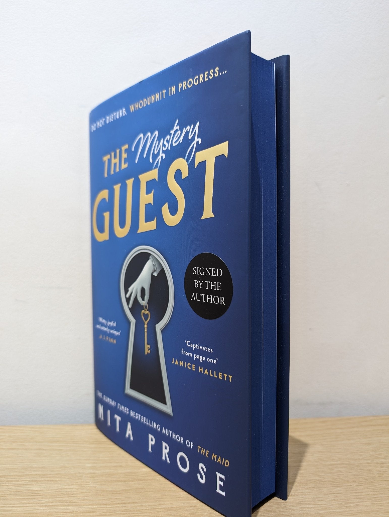 The Mystery Guest: A Molly the Maid mystery Book 2 by Nita Prose (Signed First Edition with sprayed edges) - Fialta Books