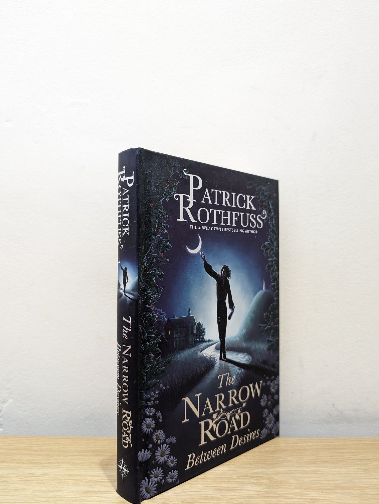 The Narrow Road Between Desires by Patrick Rothfuss (Signed First Edition) - Fialta Books
