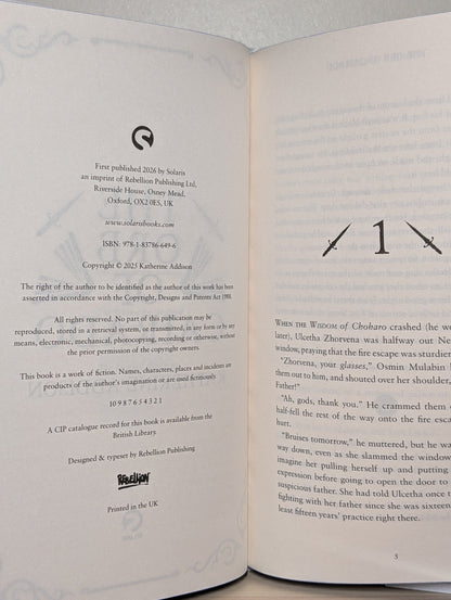 The Orb of Cairado by Katherine Addison (Signed First Edition with sprayed edges) - Fialta Books