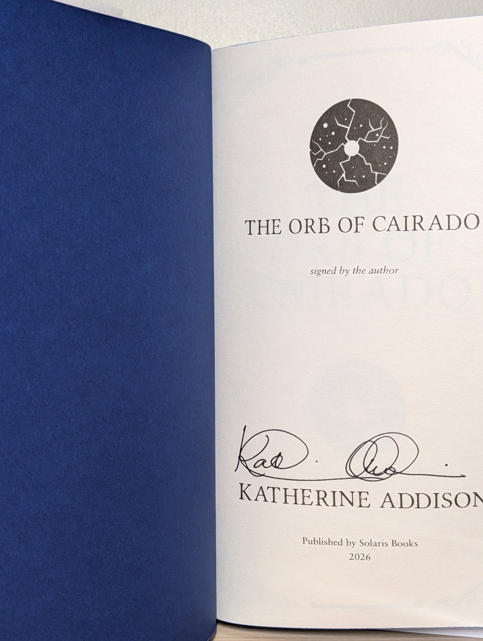 The Orb of Cairado by Katherine Addison (Signed First Edition with sprayed edges) - Fialta Books