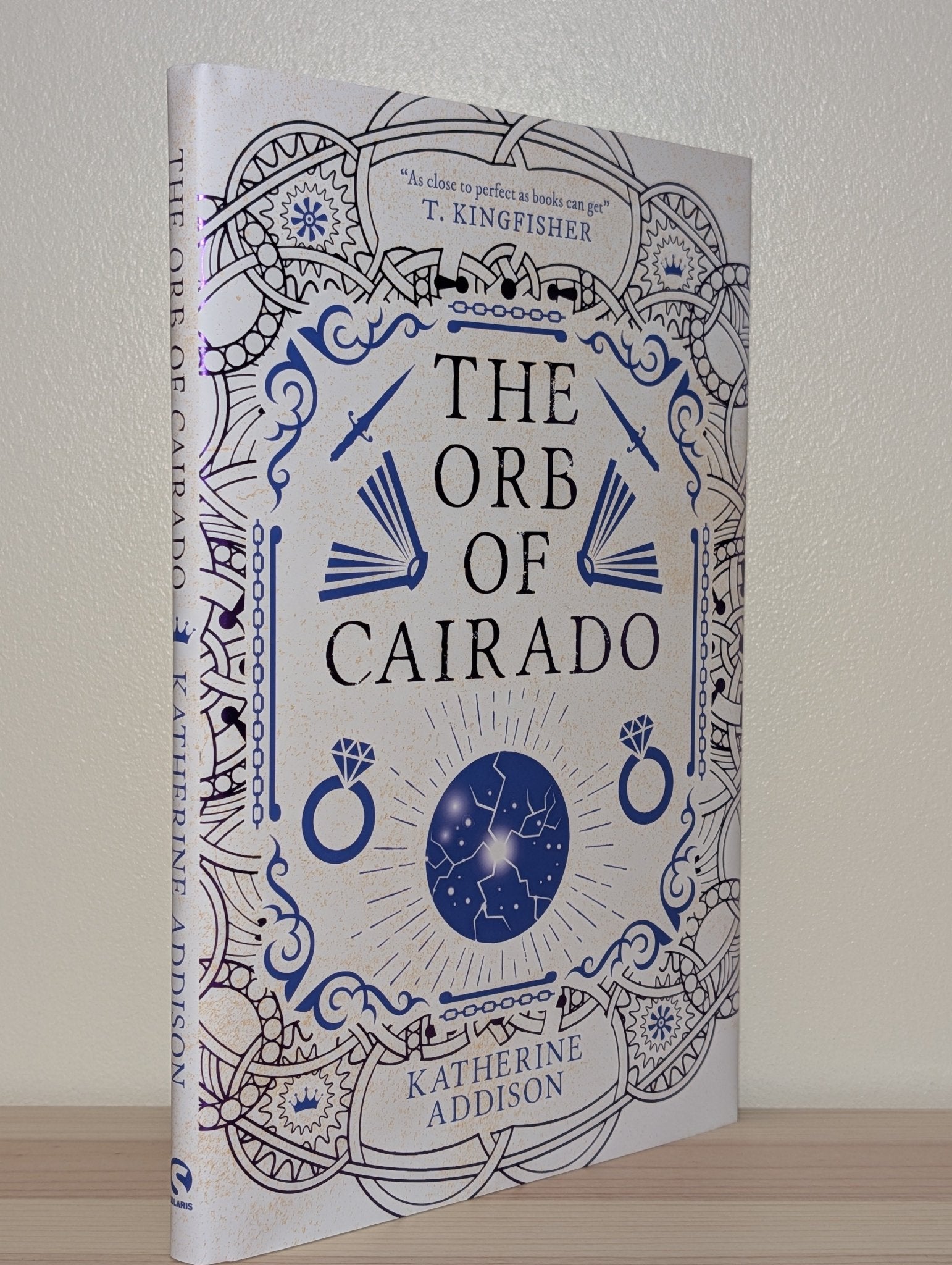 The Orb of Cairado by Katherine Addison (Signed First Edition with sprayed edges) - Fialta Books