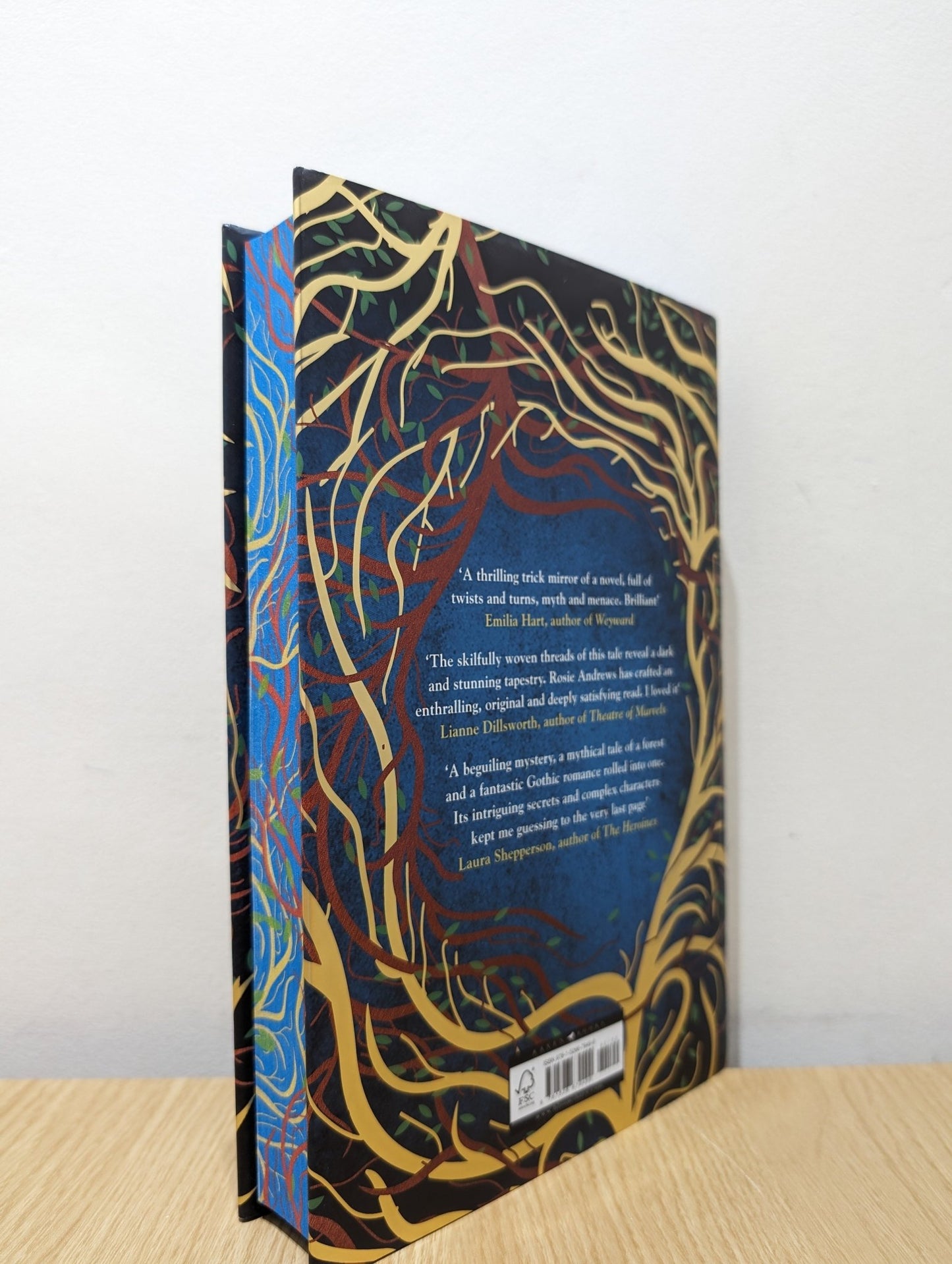 The Puzzle Wood by Rosie Andrews (Signed First Edition with sprayed edges) - Fialta Books