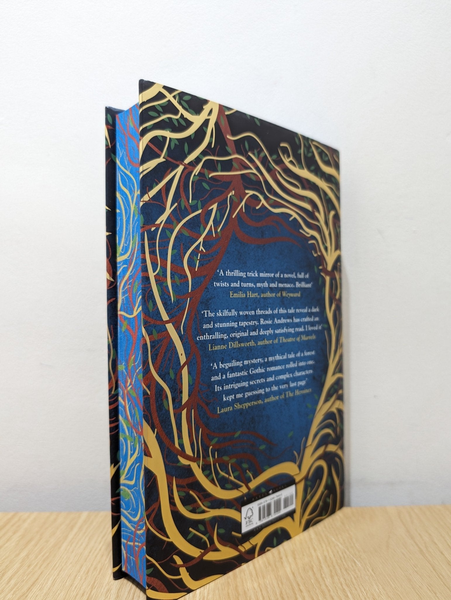 The Puzzle Wood by Rosie Andrews (Signed First Edition with sprayed edges) - Fialta Books