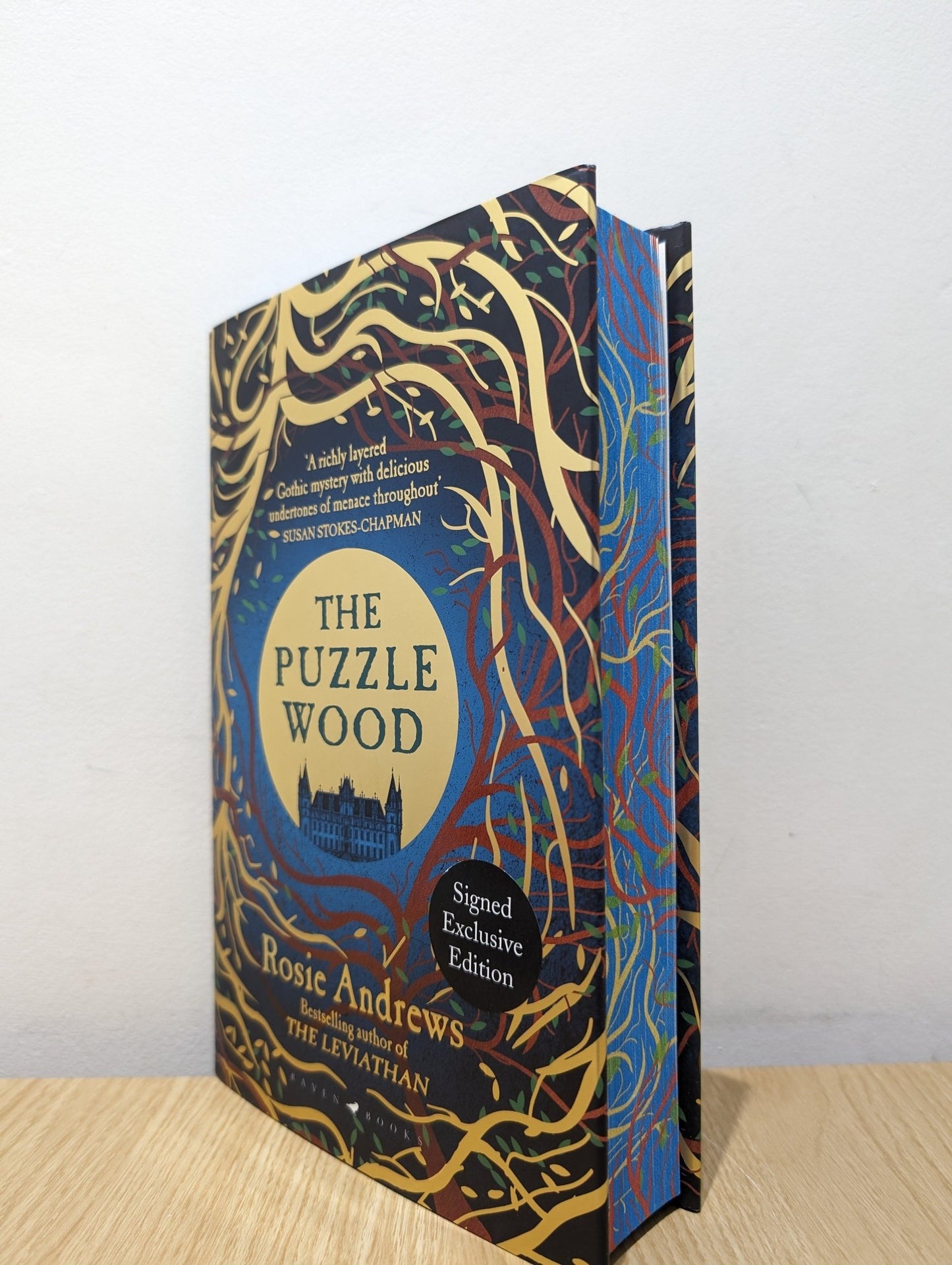 The Puzzle Wood by Rosie Andrews (Signed First Edition with sprayed edges) - Fialta Books