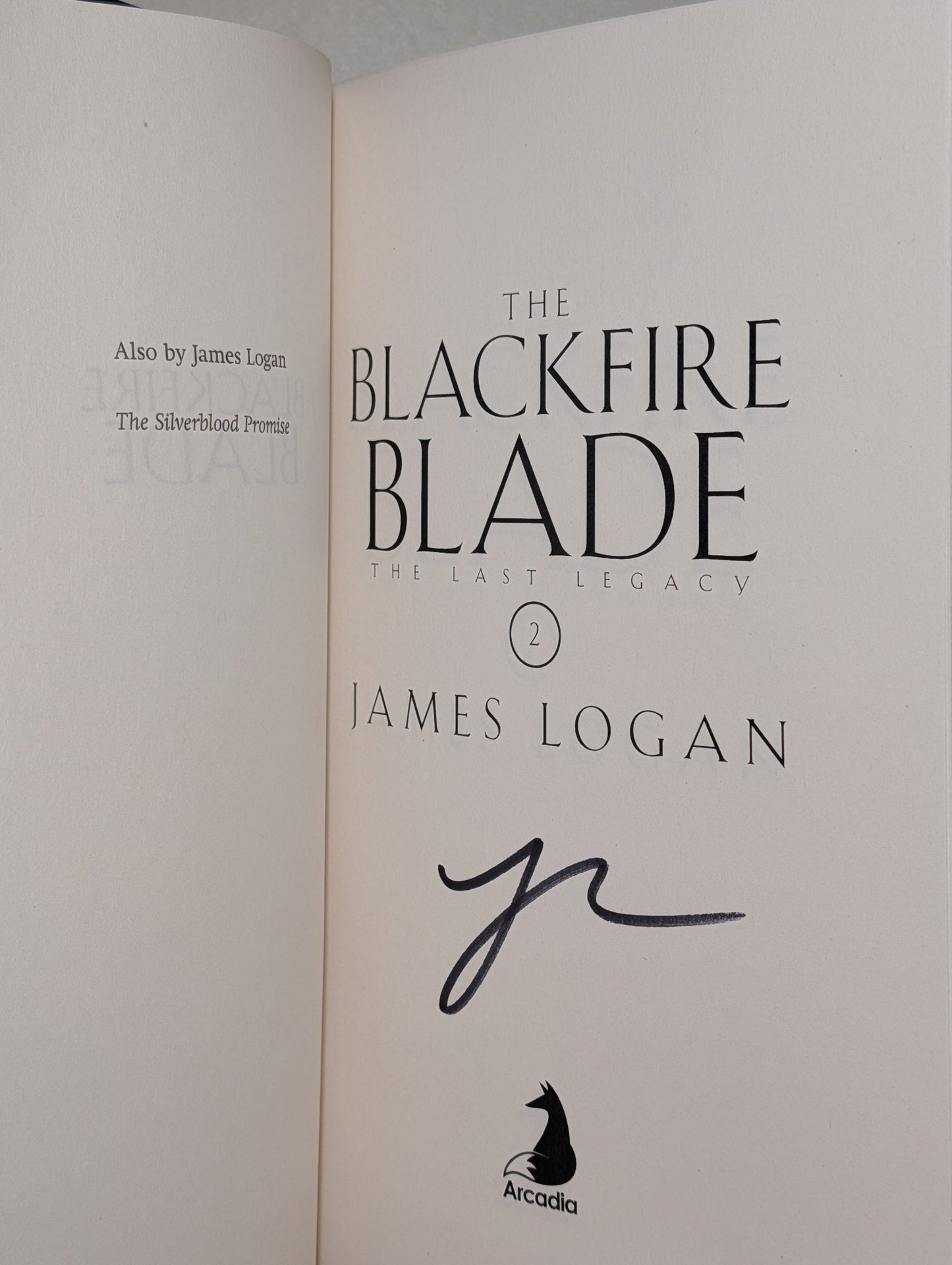 The Silverblood Promise; Blackfire Blade by James Logan (Signed First Edition Set) - Fialta Books