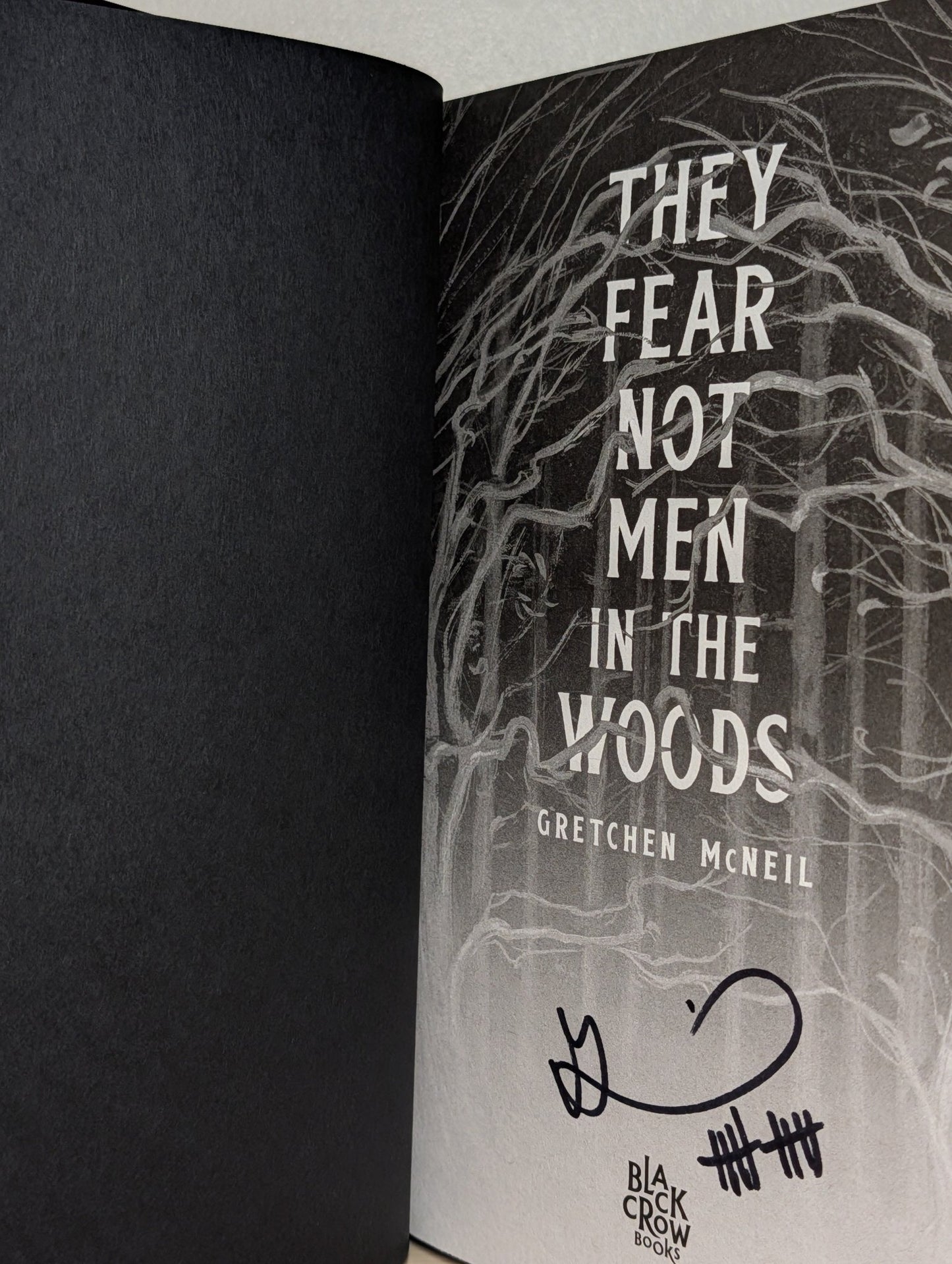 They Fear Not Men in The Woods by Gretchen McNeil (Signed First Edition with sprayed edges) - Fialta Books