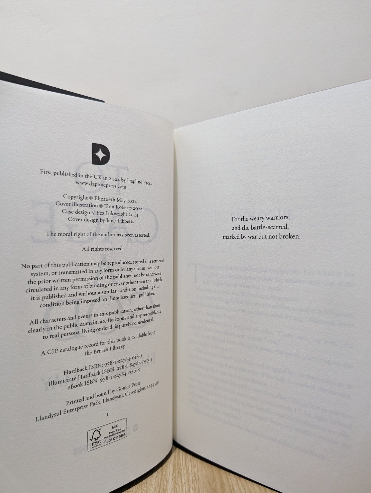 To Cage a God by Elizabeth May (Signed First Edition with sprayed edges) - Fialta Books