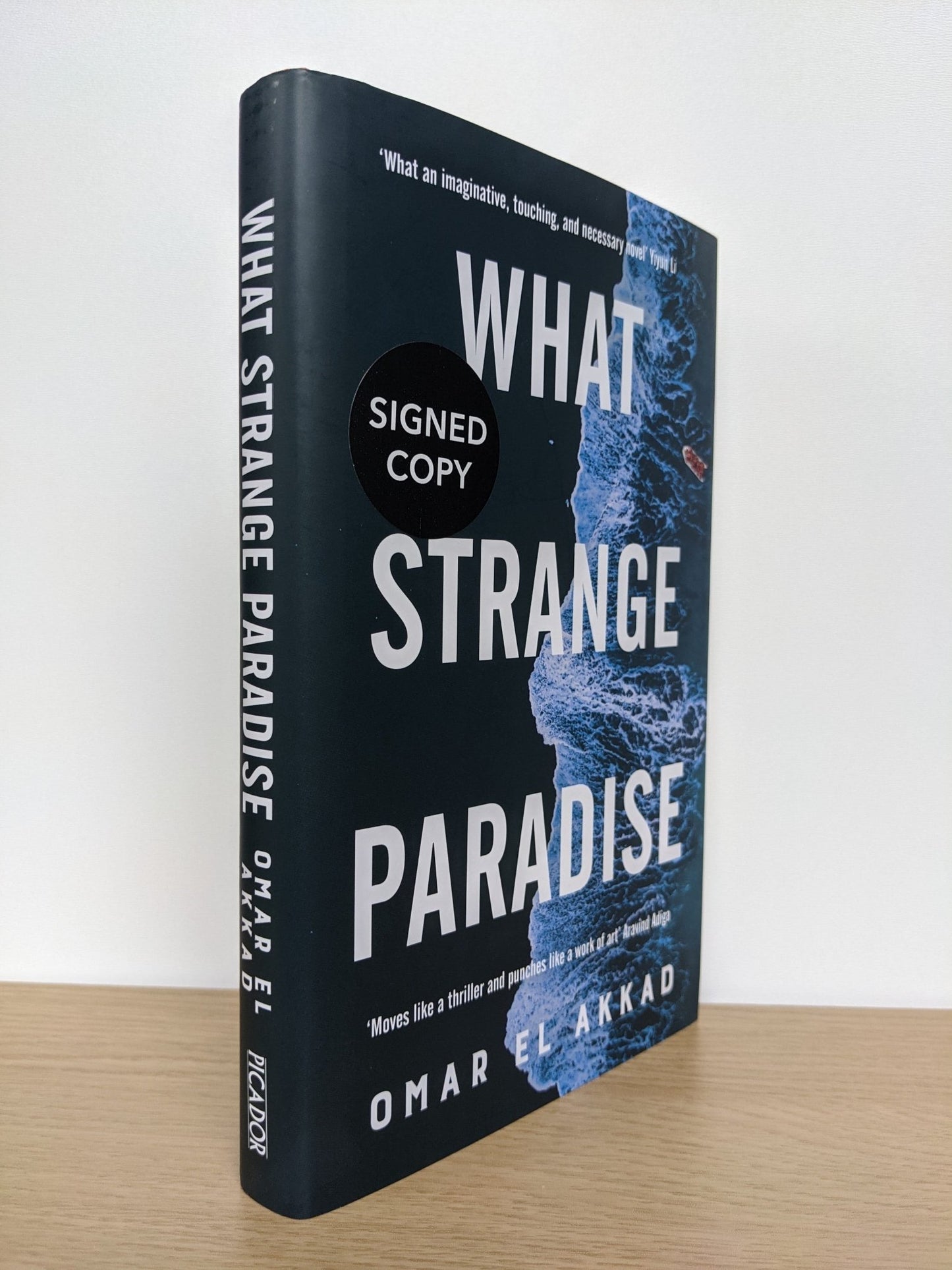 What Strange Paradise by Omar El Akkad (Signed First Edition) - Fialta Books