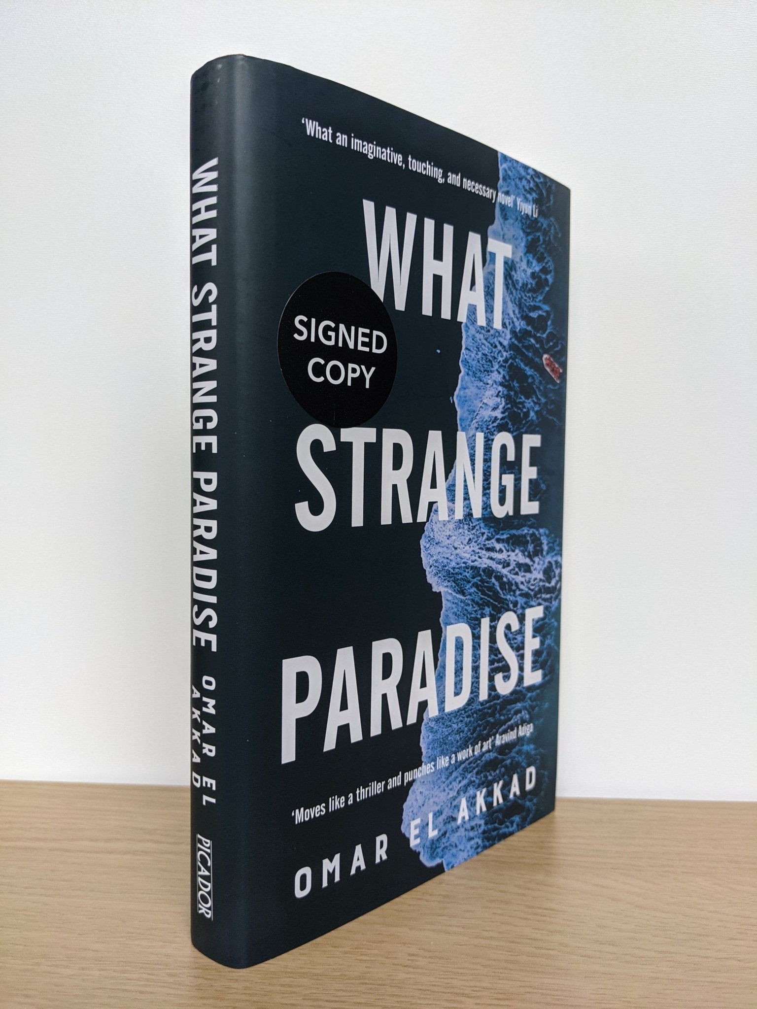 What Strange Paradise by Omar El Akkad (Signed First Edition) - Fialta Books
