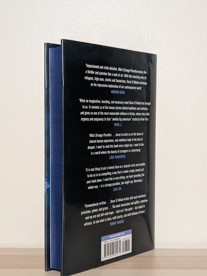 What Strange Paradise by Omar El Akkad (Signed First Edition with sprayed edges) - Fialta Books