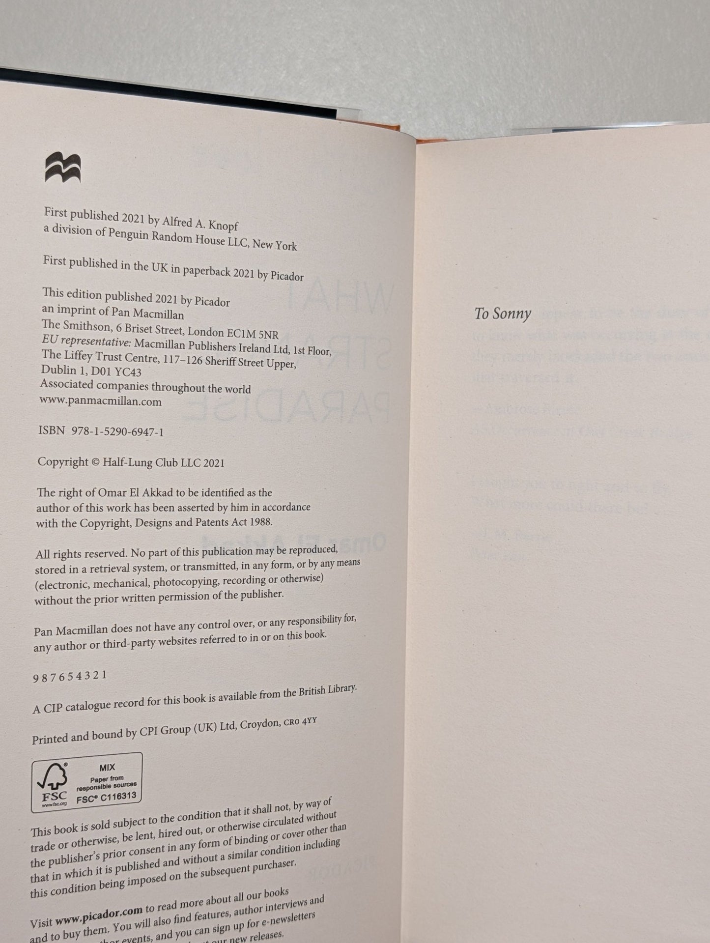 What Strange Paradise by Omar El Akkad (Signed First Edition with sprayed edges) - Fialta Books